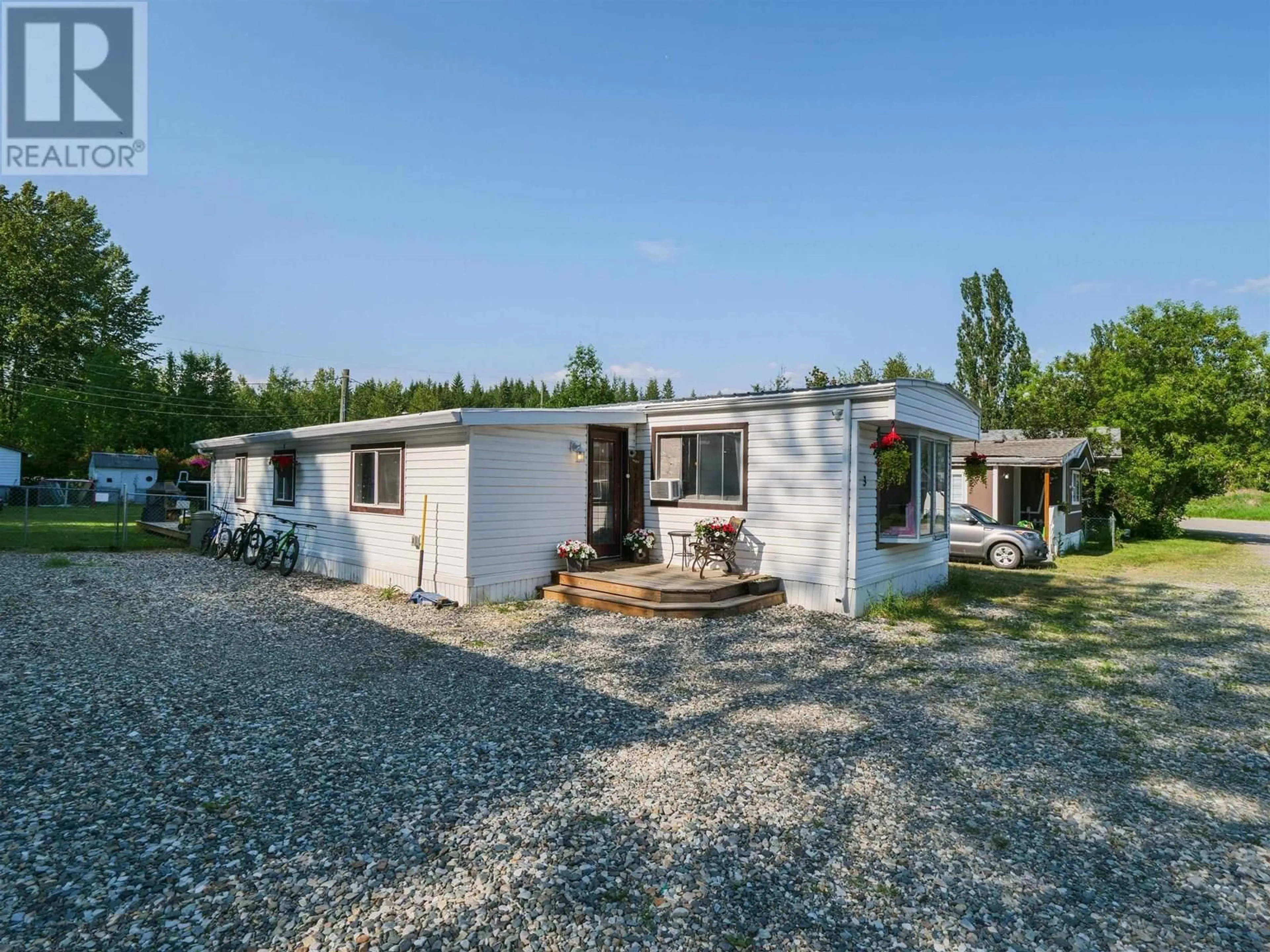A pic from outside/outdoor area/front of a property/back of a property/a pic from drone, building for 3 - 3211 GOOK ROAD, Quesnel British Columbia V2J6N6