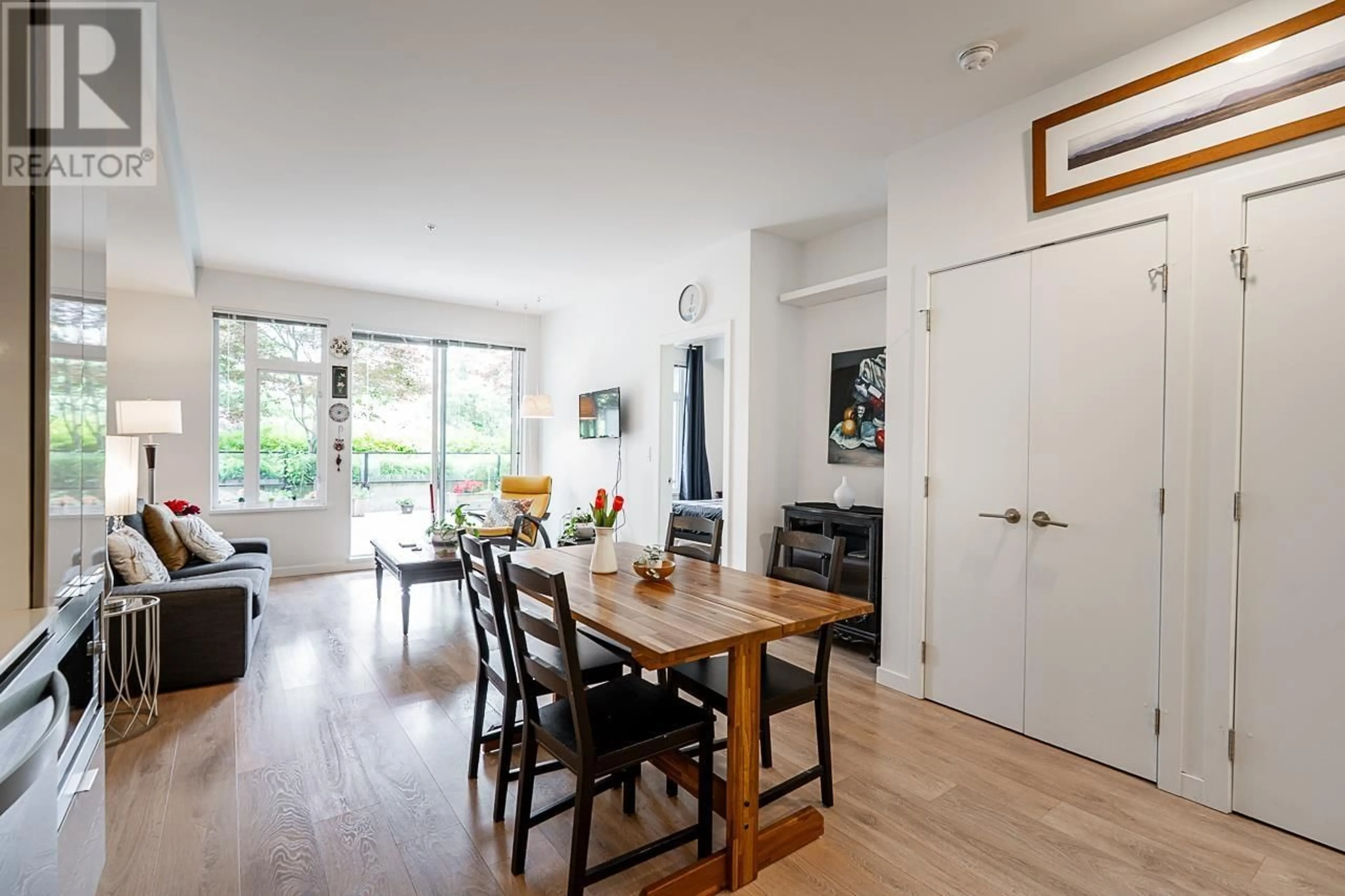 Dining room, wood/laminate floor for 218 - 725 MARINE DRIVE, North Vancouver British Columbia V7M0G2