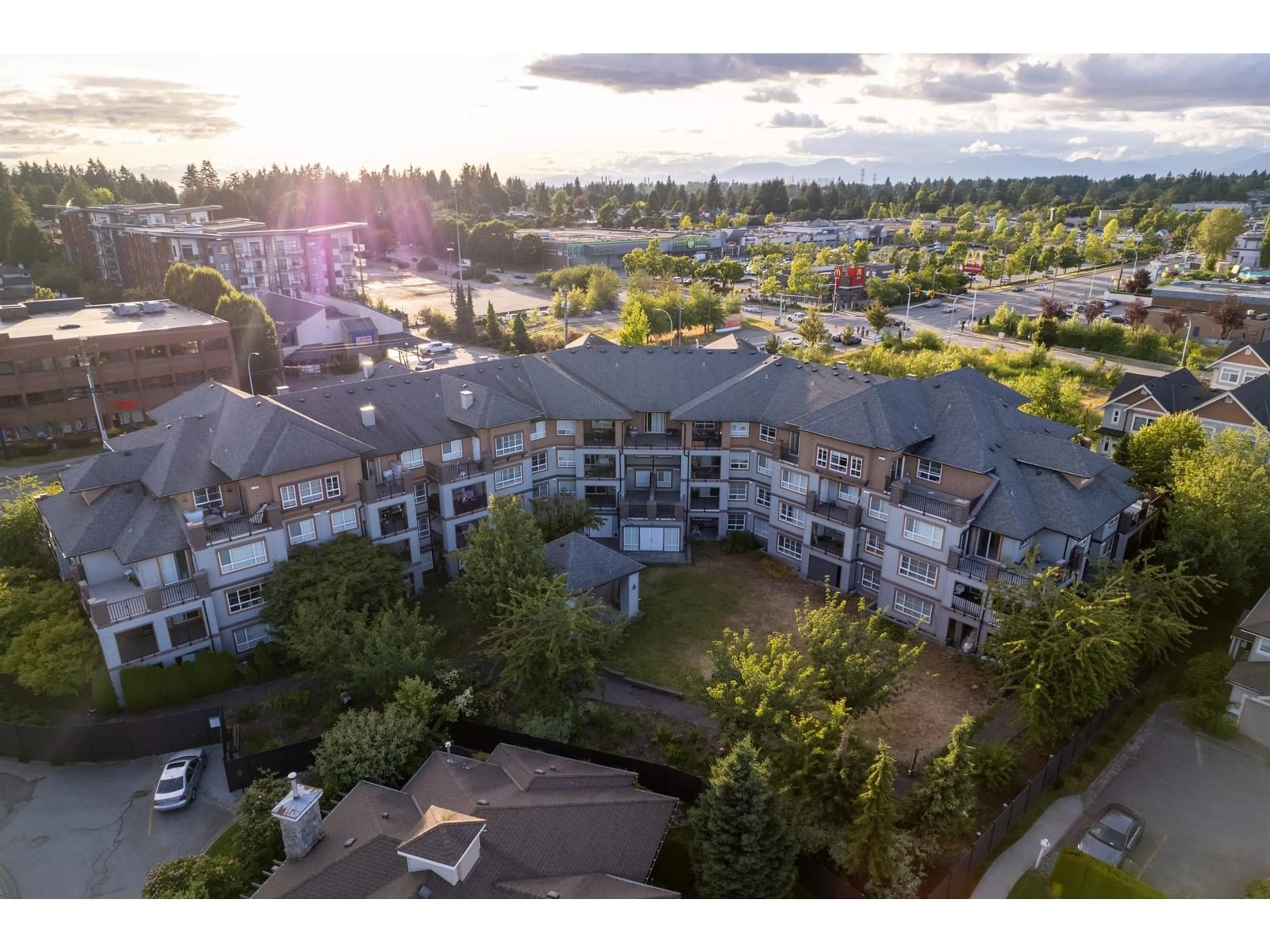 A pic from outside/outdoor area/front of a property/back of a property/a pic from drone, water/lake/river/ocean view for 314 - 6960 120, Surrey British Columbia V3W1V4
