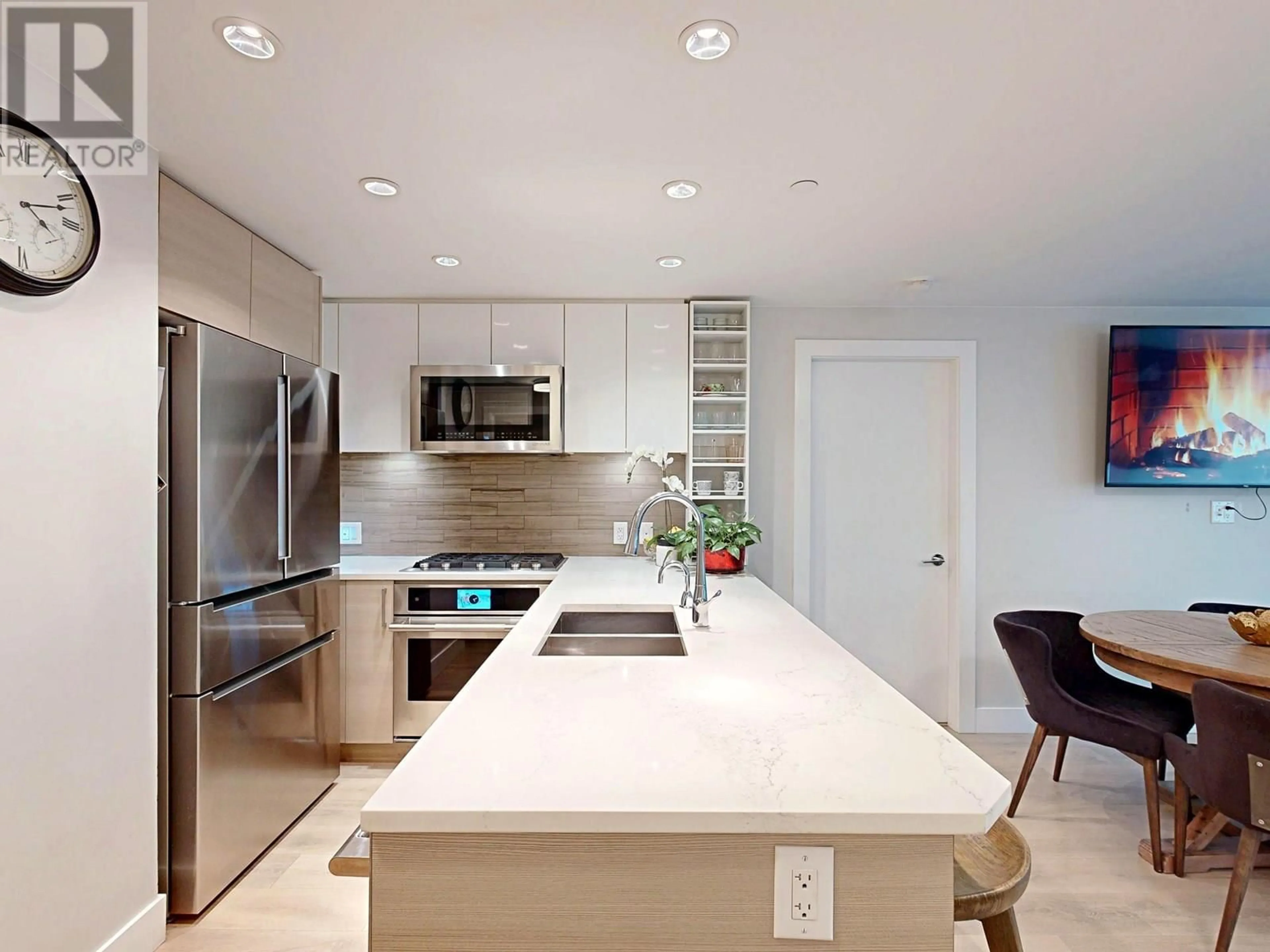 Contemporary kitchen, ceramic/tile floor for 311 - 3451 SAWMILL CRESCENT, Vancouver British Columbia V5S0H3