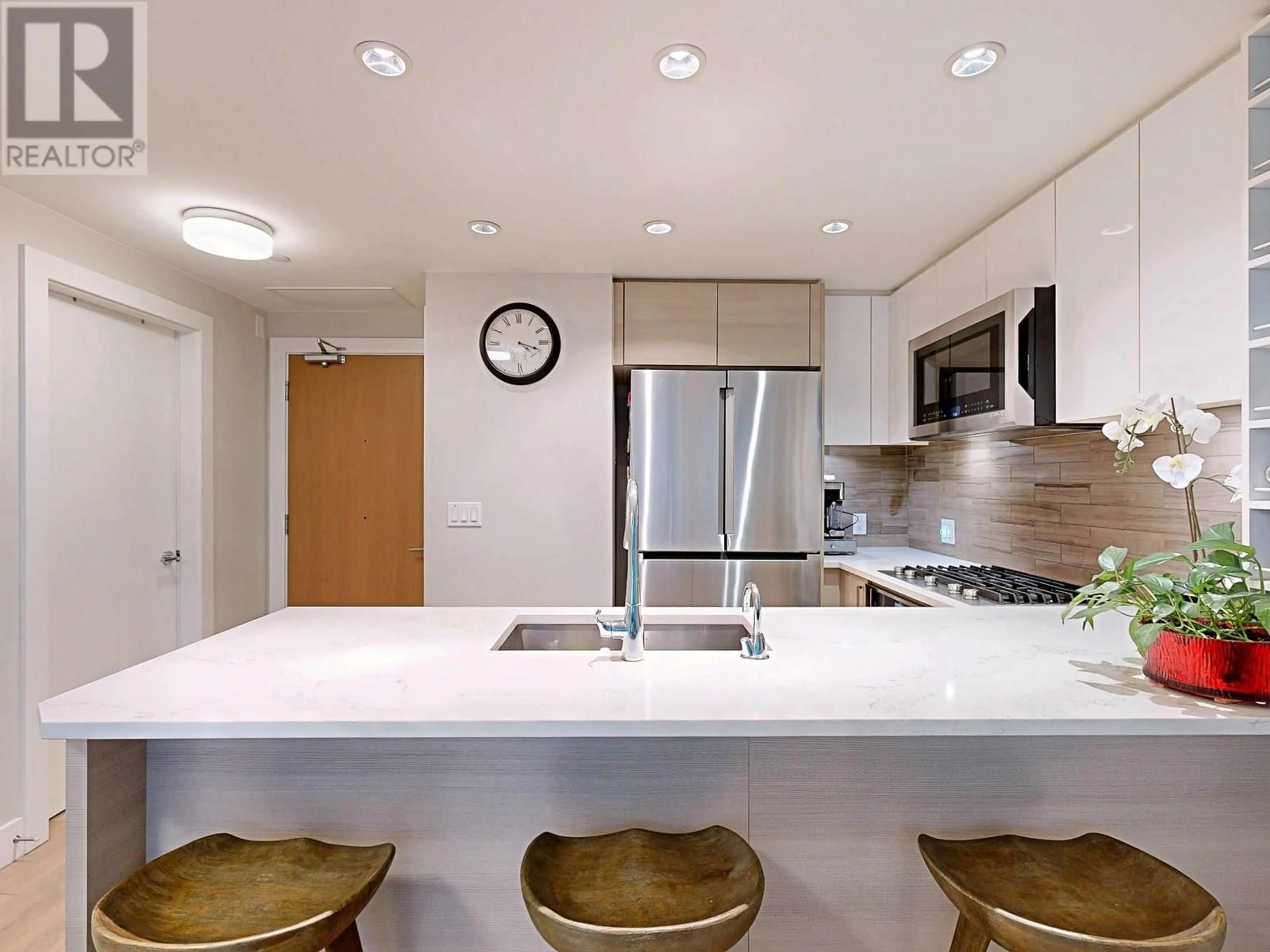 Contemporary kitchen, unknown for 311 - 3451 SAWMILL CRESCENT, Vancouver British Columbia V5S0H3