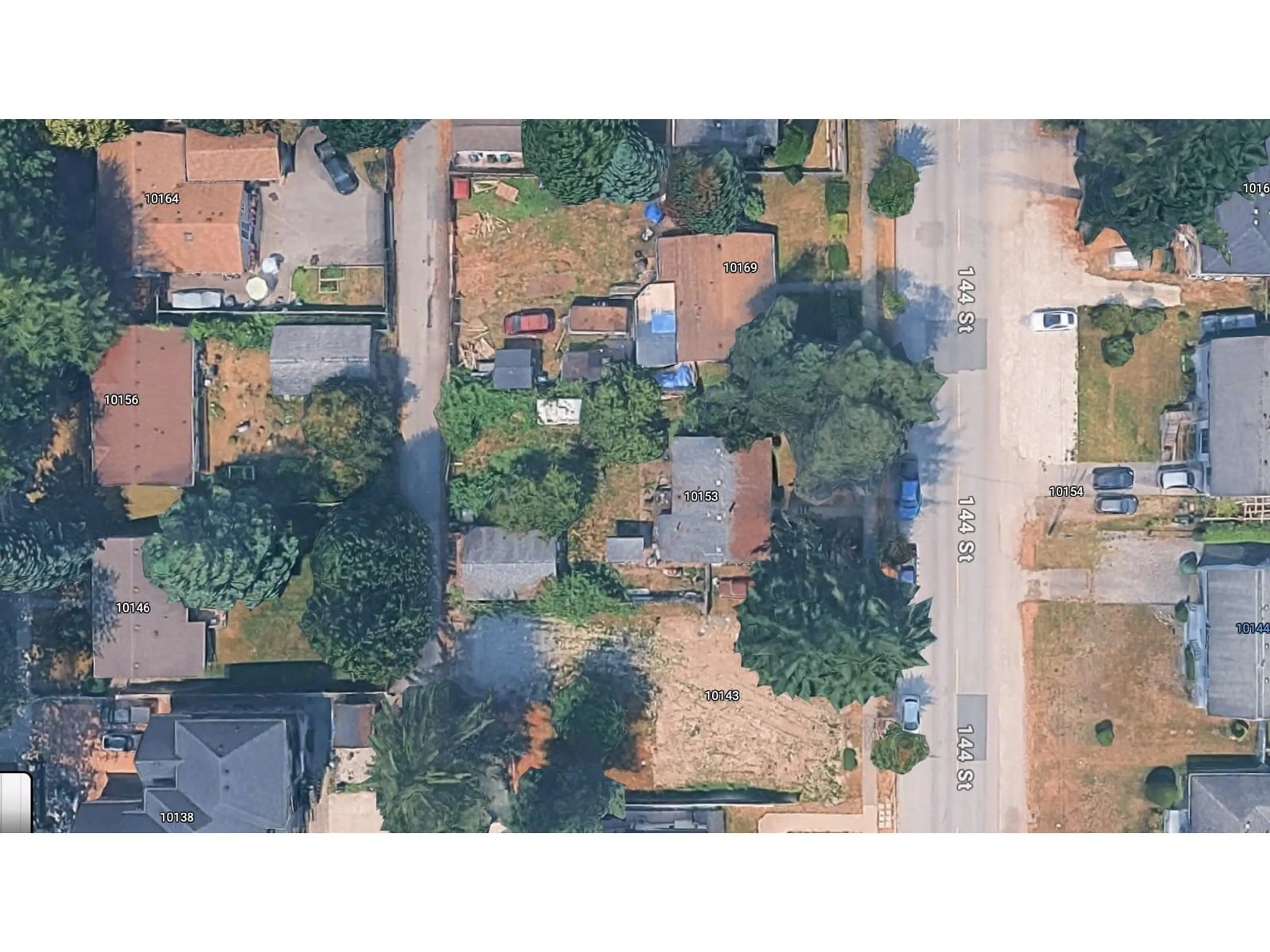 A pic from outside/outdoor area/front of a property/back of a property/a pic from drone, street for 10153 144, Surrey British Columbia V3T4T9