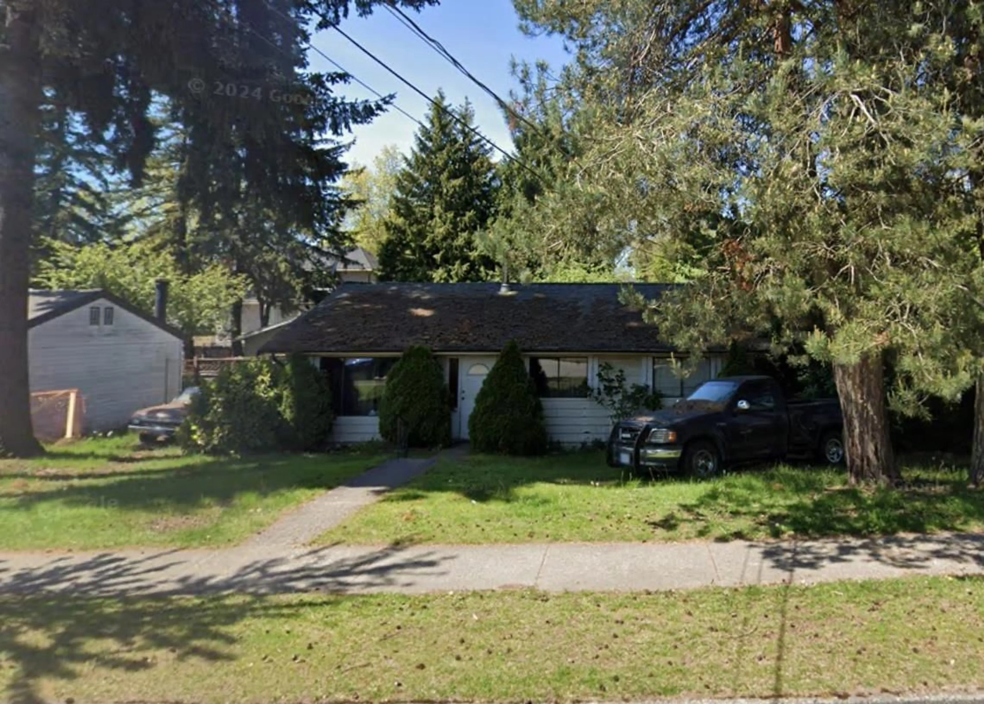 A pic from outside/outdoor area/front of a property/back of a property/a pic from drone, street for 10153 144, Surrey British Columbia V3T4T9