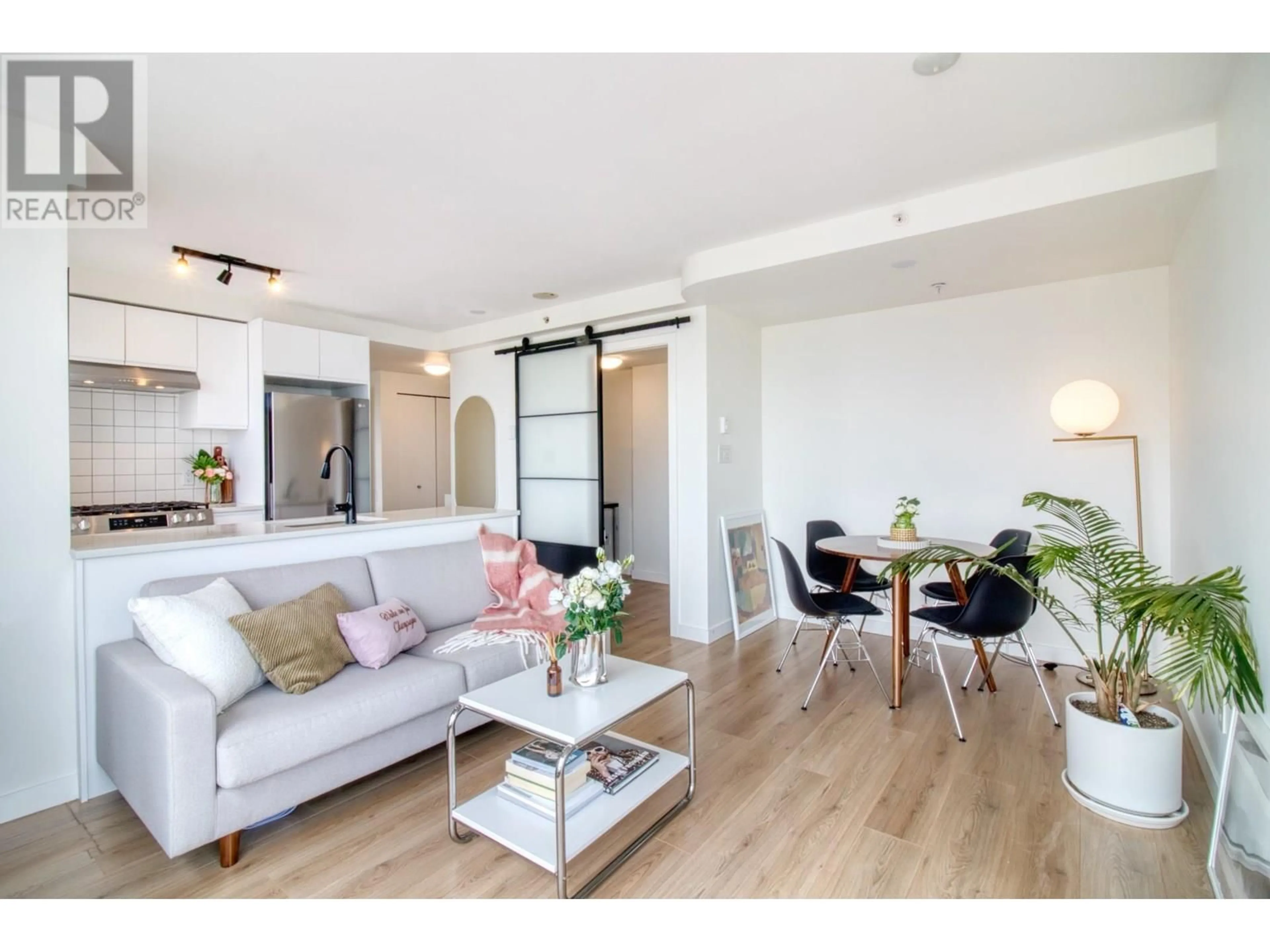 Living room with furniture, wood/laminate floor for 803 - 2483 SPRUCE STREET, Vancouver British Columbia V6H4J2