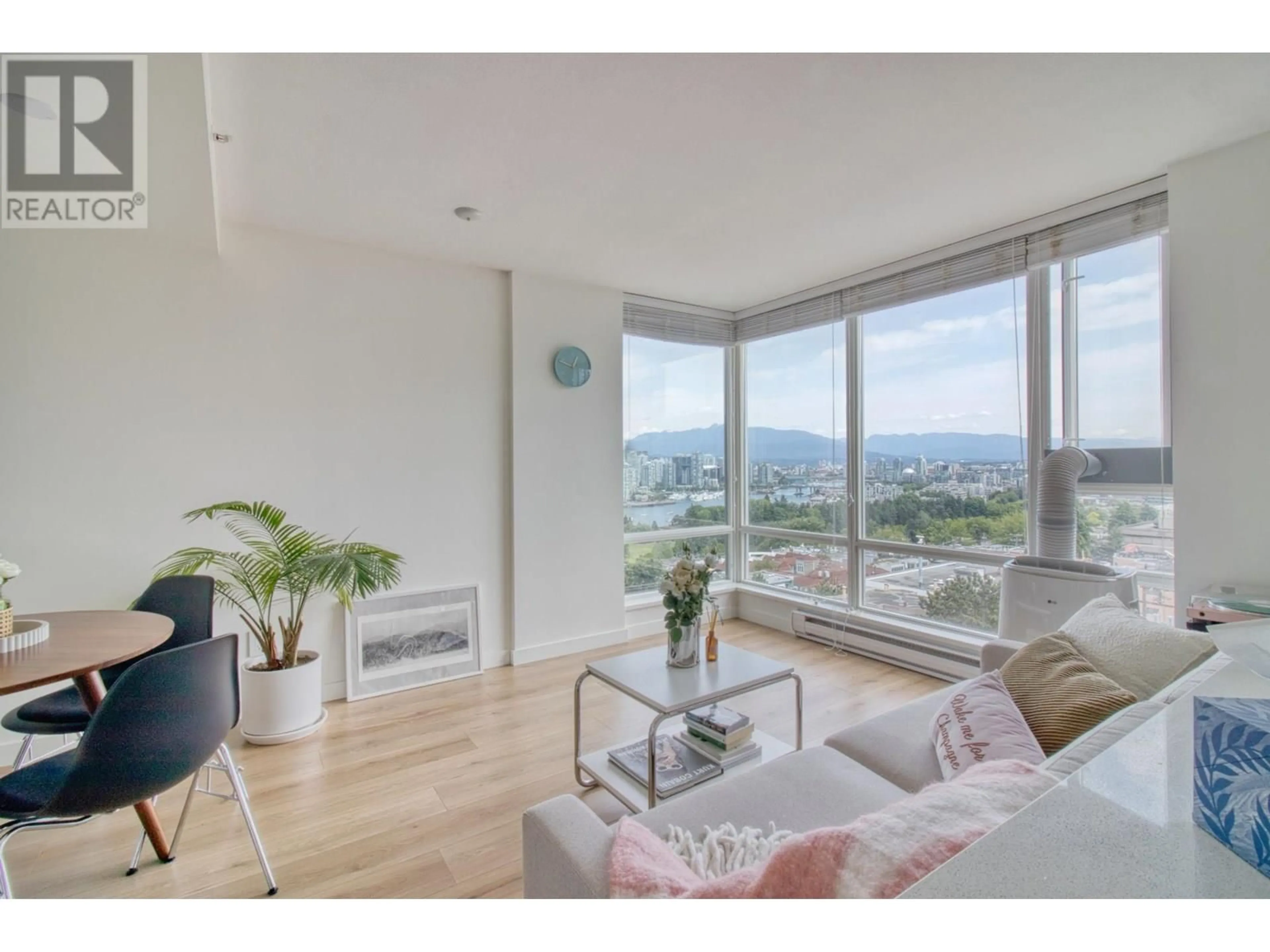Living room with furniture, wood/laminate floor for 803 - 2483 SPRUCE STREET, Vancouver British Columbia V6H4J2