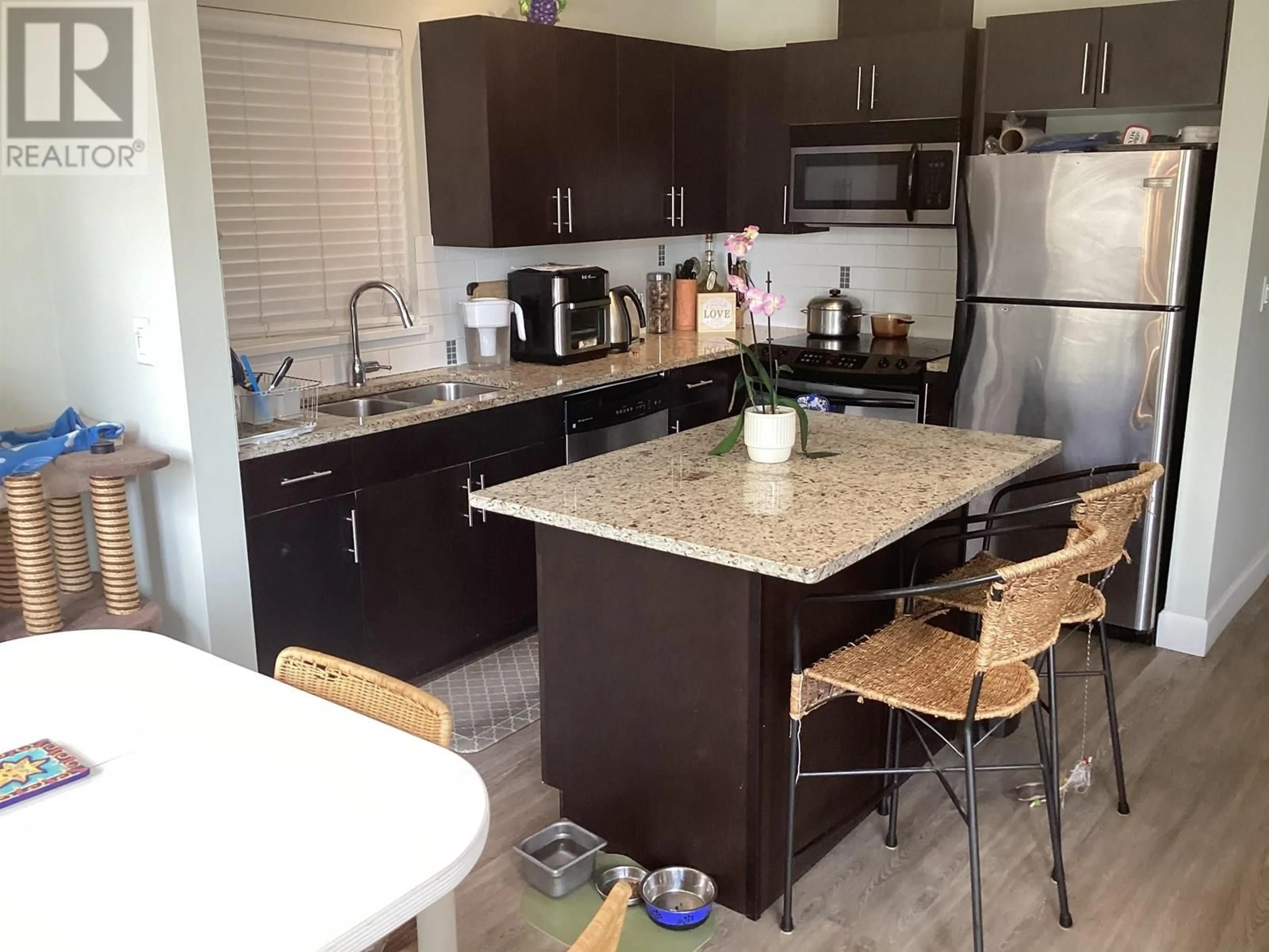 Open concept kitchen, unknown for 121 - 2108 ROWLAND STREET, Port Coquitlam British Columbia V3C0C1