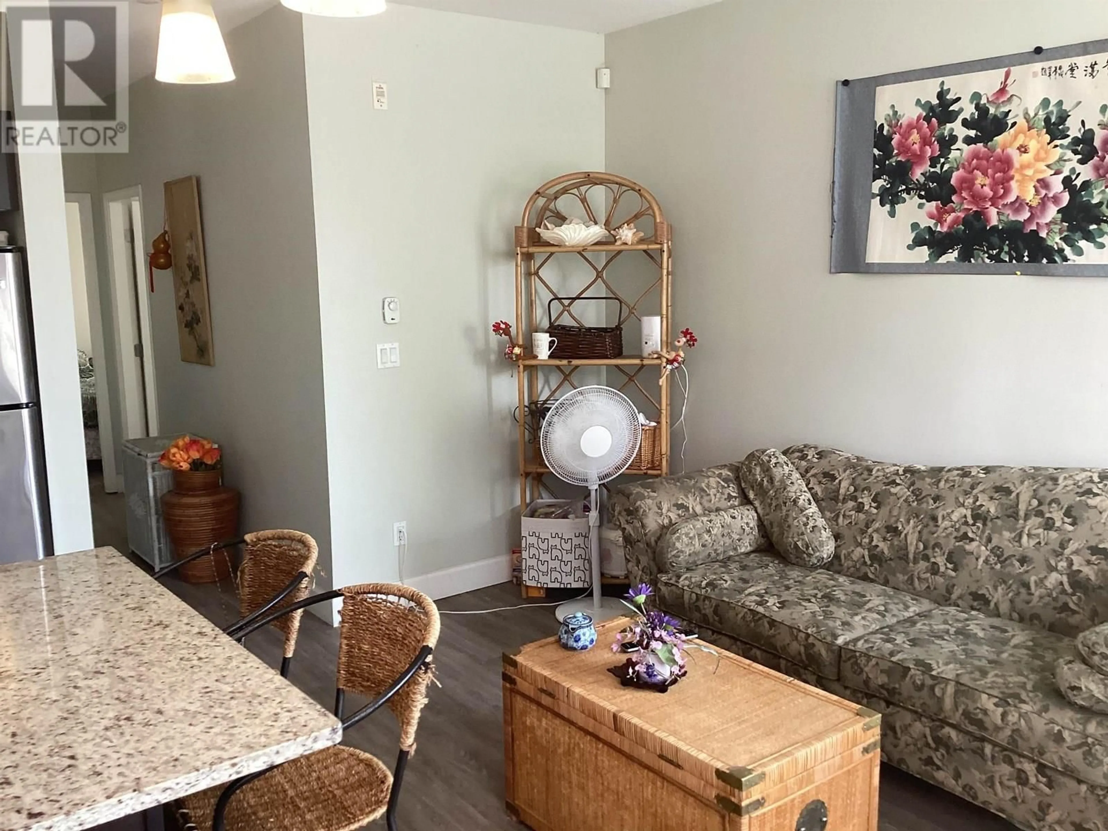 Living room with furniture, wood/laminate floor for 121 - 2108 ROWLAND STREET, Port Coquitlam British Columbia V3C0C1