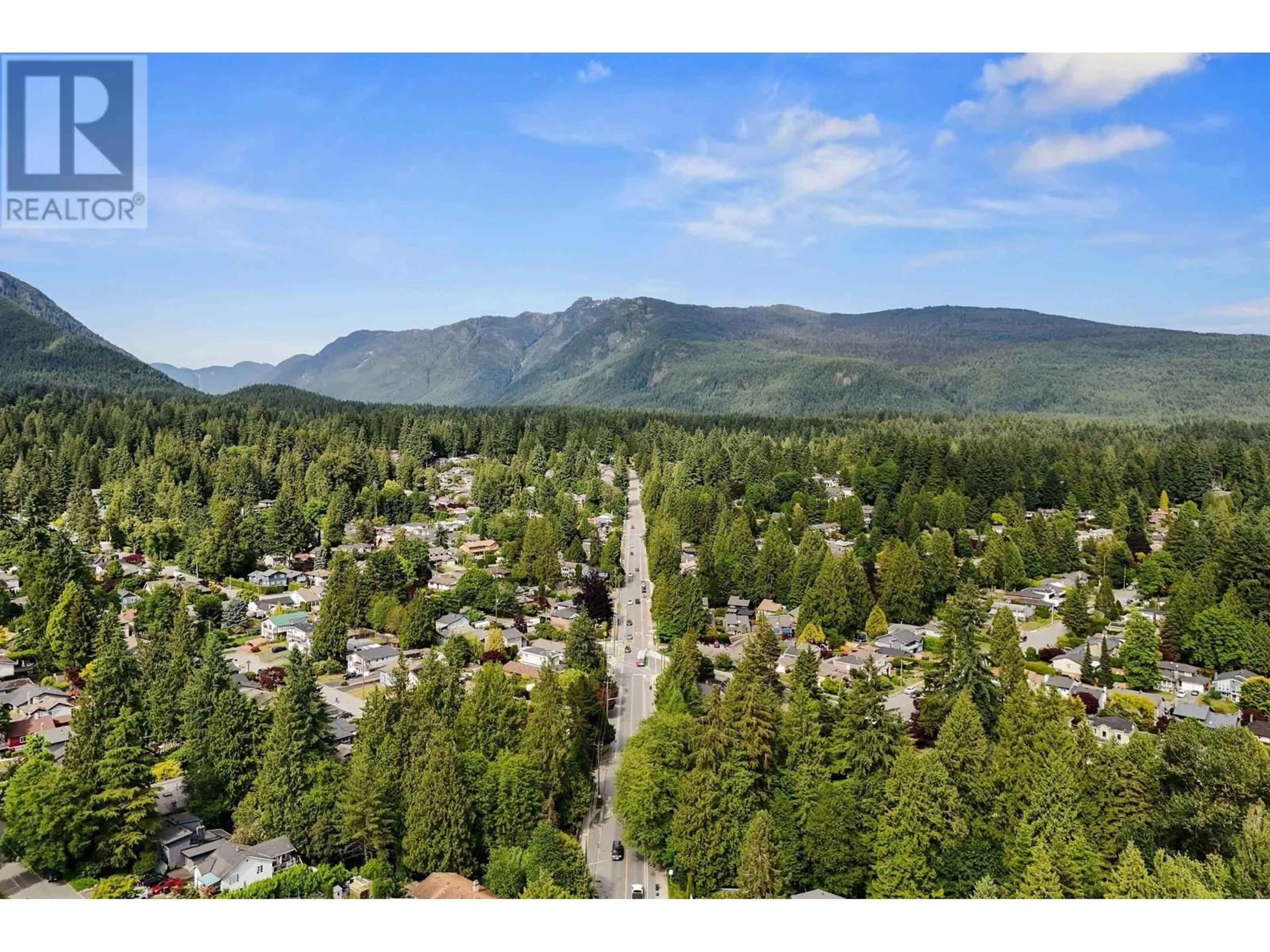 A pic from outside/outdoor area/front of a property/back of a property/a pic from drone, mountain view for 1430 DRAYCOTT ROAD, North Vancouver British Columbia V7J1W2