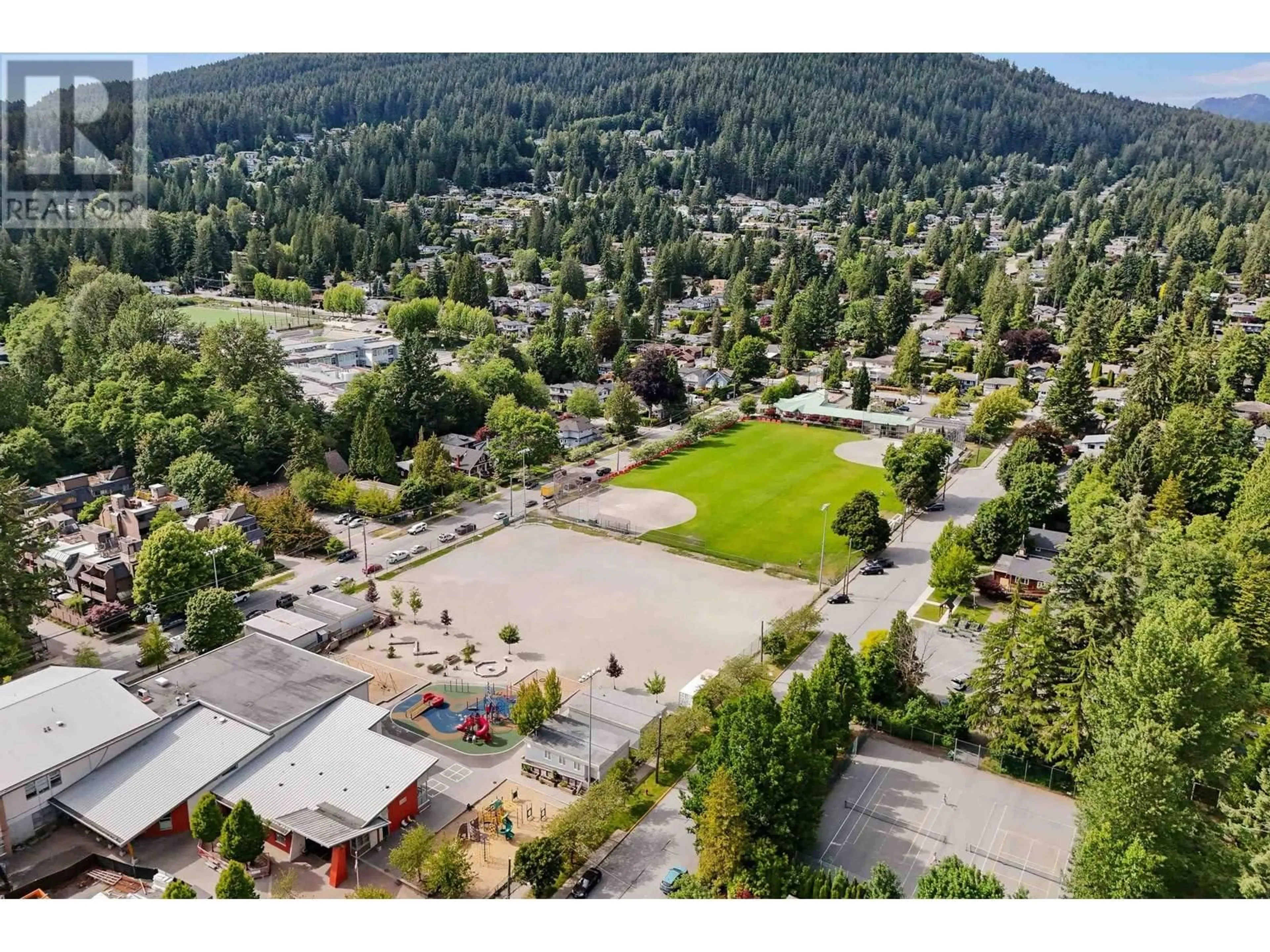A pic from outside/outdoor area/front of a property/back of a property/a pic from drone, mountain view for 1430 DRAYCOTT ROAD, North Vancouver British Columbia V7J1W2