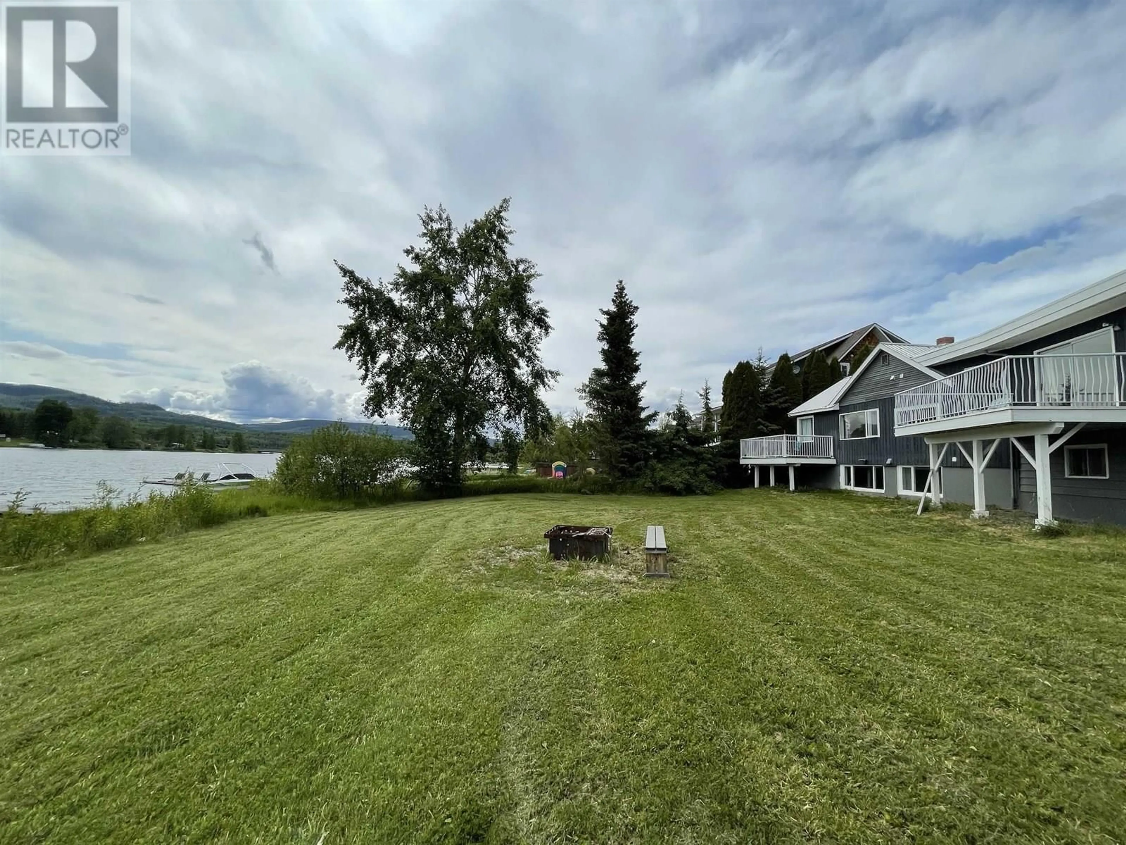 A pic from outside/outdoor area/front of a property/back of a property/a pic from drone, water/lake/river/ocean view for 298 PIONEER WAY, Burns Lake British Columbia V0J1E0