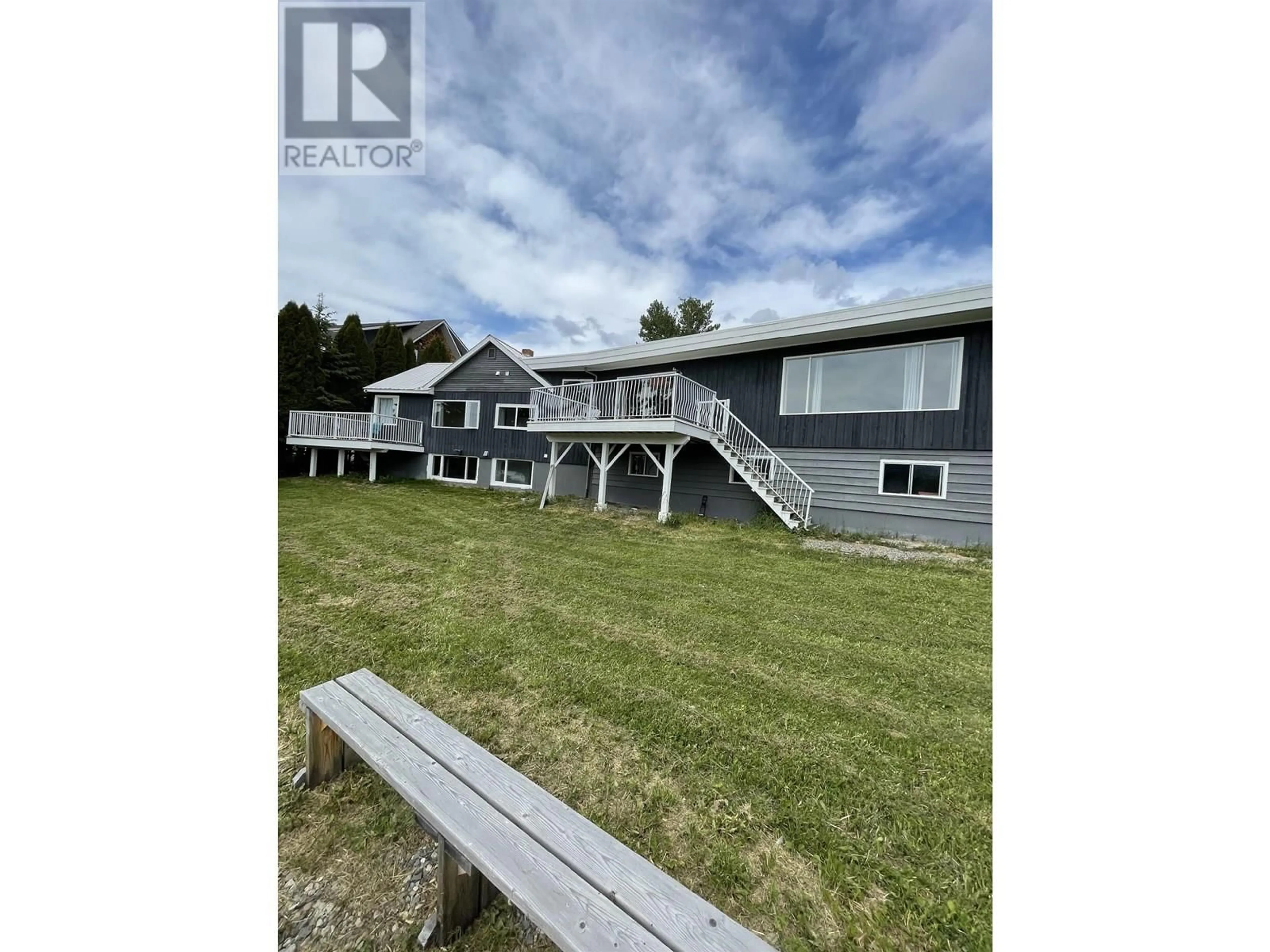 A pic from outside/outdoor area/front of a property/back of a property/a pic from drone, water/lake/river/ocean view for 298 PIONEER WAY, Burns Lake British Columbia V0J1E0