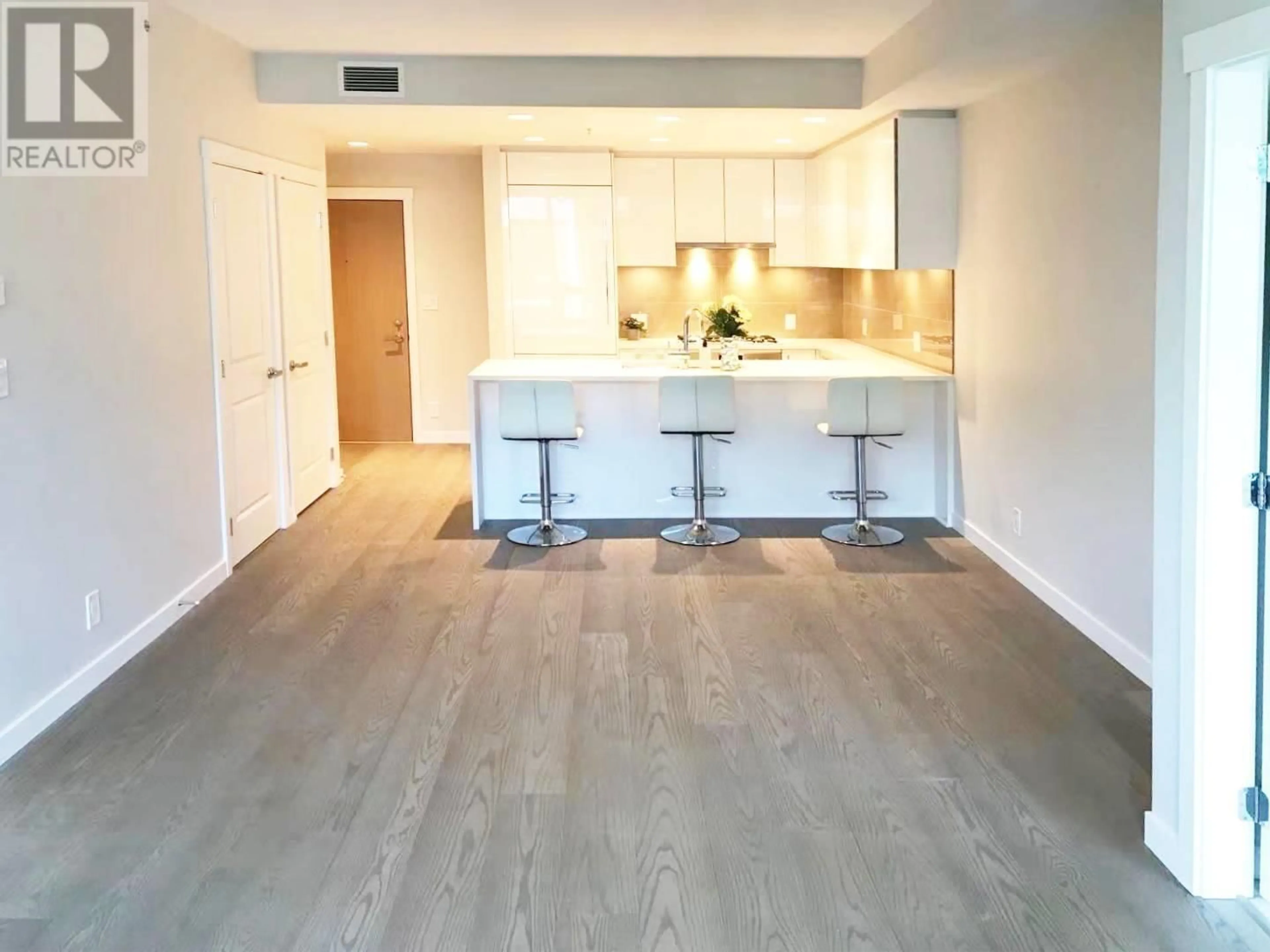 Open concept kitchen, wood/laminate floor for 507 - 3533 ROSS DRIVE, Vancouver British Columbia V6S0L3