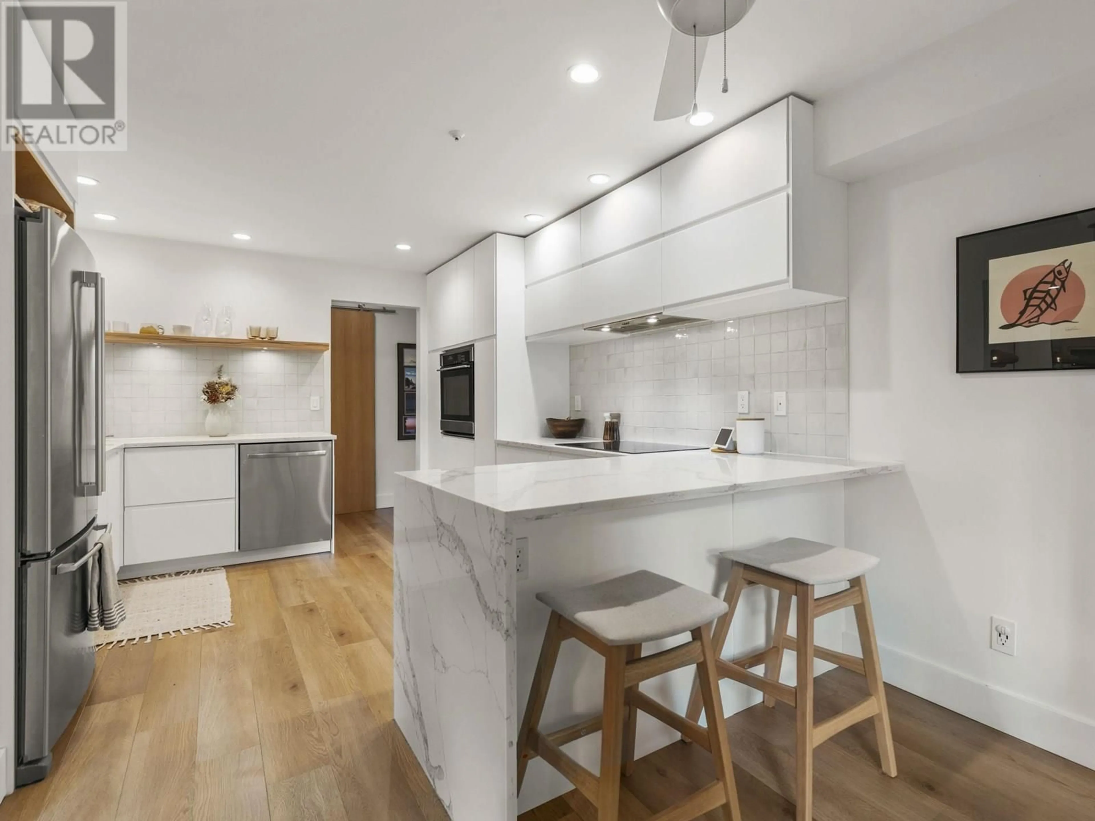 Open concept kitchen, unknown for 105 - 1150 LYNN VALLEY ROAD, North Vancouver British Columbia V7J1Z9