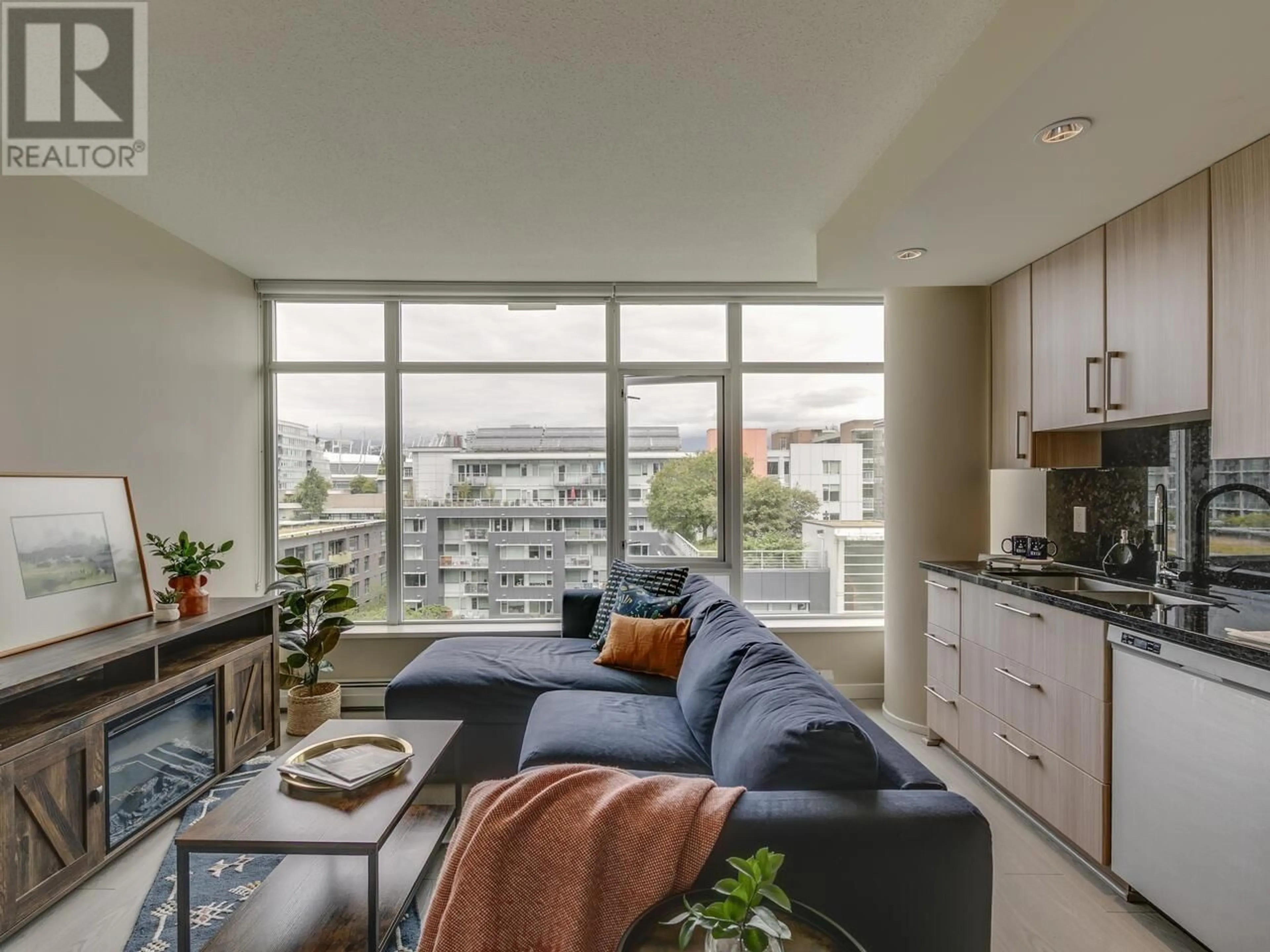 Living room with furniture, unknown for 809 - 138 1ST AVENUE, Vancouver British Columbia V5Y0H5