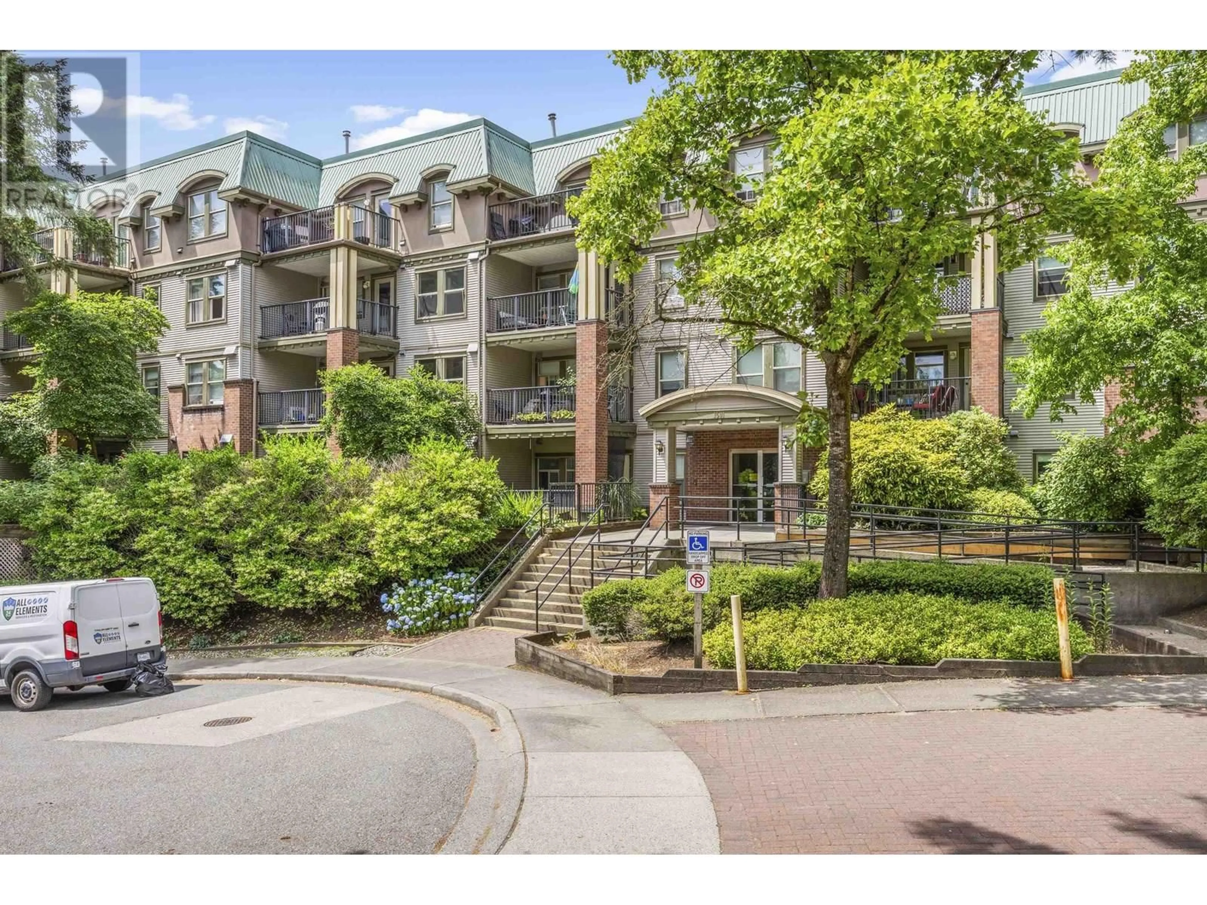 A pic from outside/outdoor area/front of a property/back of a property/a pic from drone, mountain view for 409 - 1591 BOOTH AVENUE, Coquitlam British Columbia V3K1B7