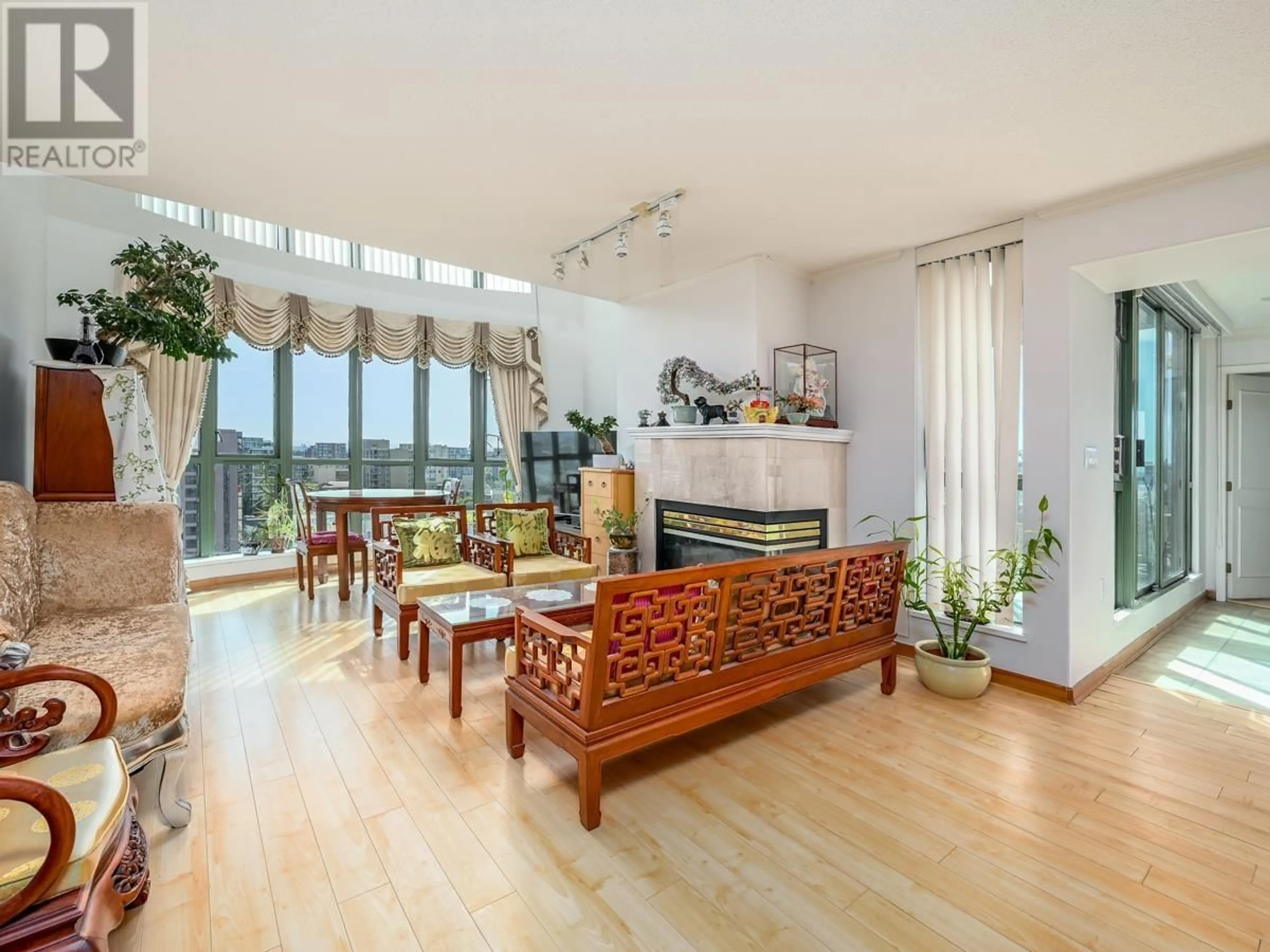 Living room with furniture, wood/laminate floor for 1802 - 7380 ELMBRIDGE WAY, Richmond British Columbia V6X4A1