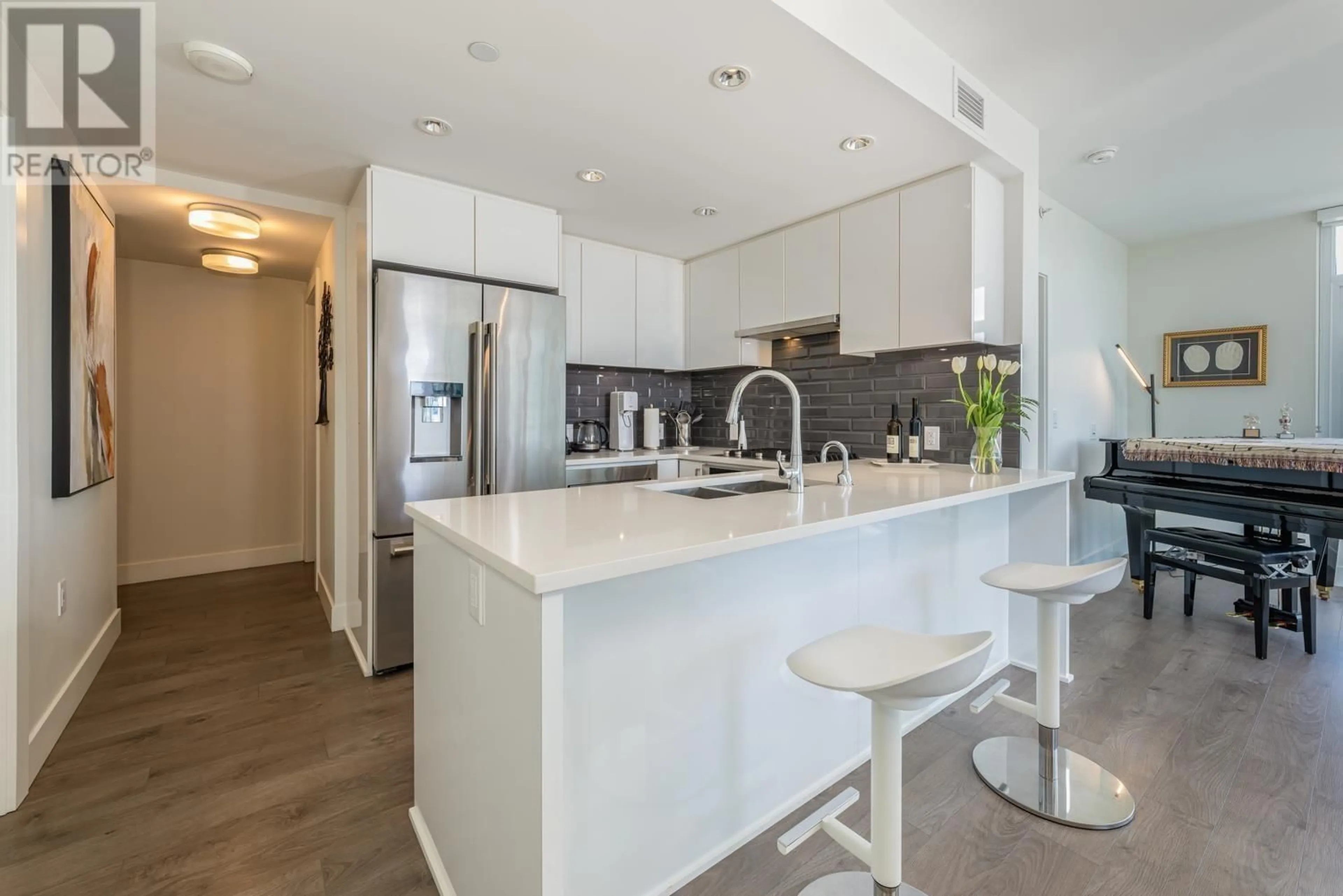 Open concept kitchen, ceramic/tile floor for 1501 - 8533 RIVER DISTRICT CROSSING, Vancouver British Columbia V5S0H2