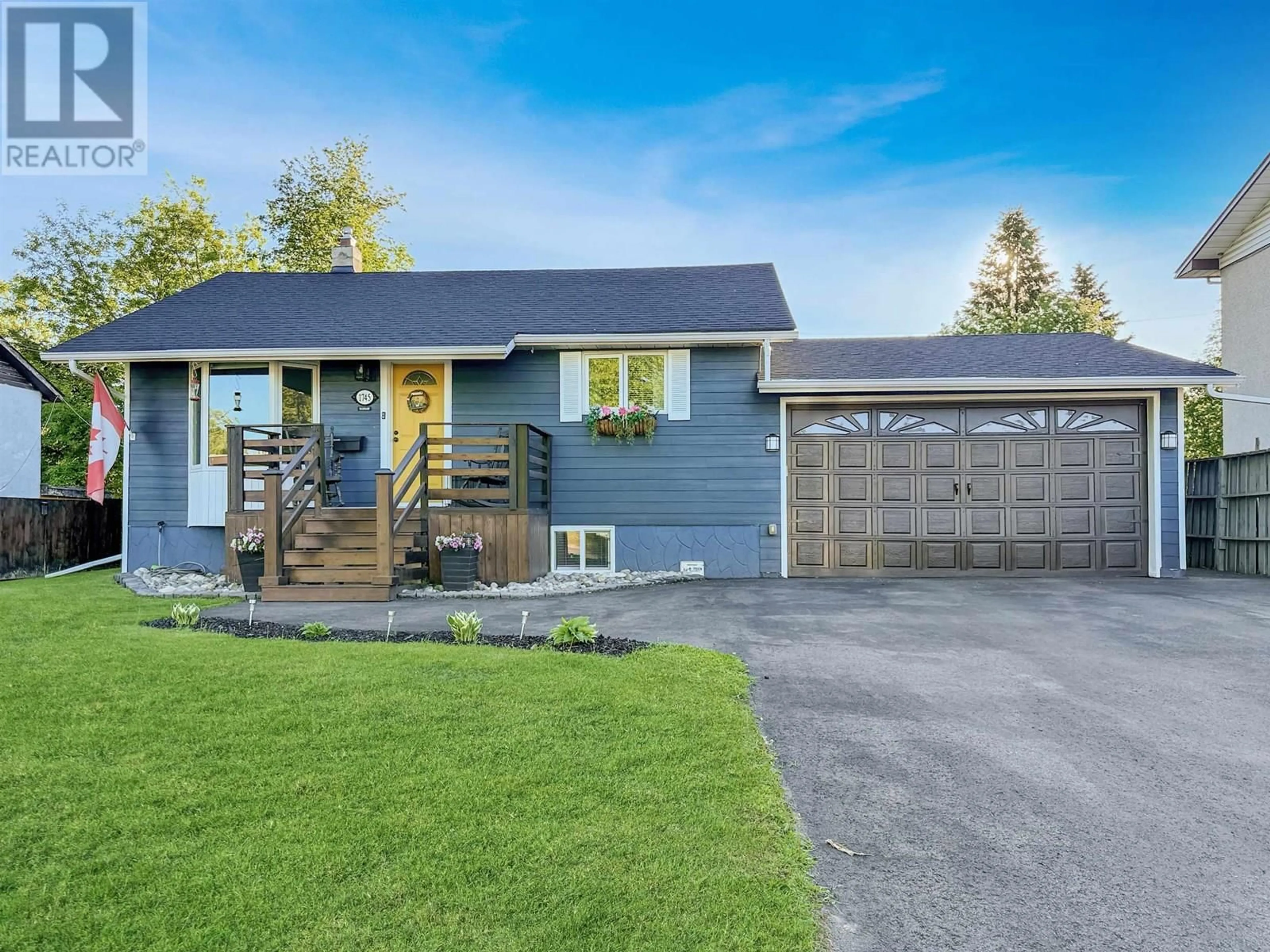 Home with vinyl exterior material, street for 1745 NORWOOD STREET, Prince George British Columbia V2L1X7
