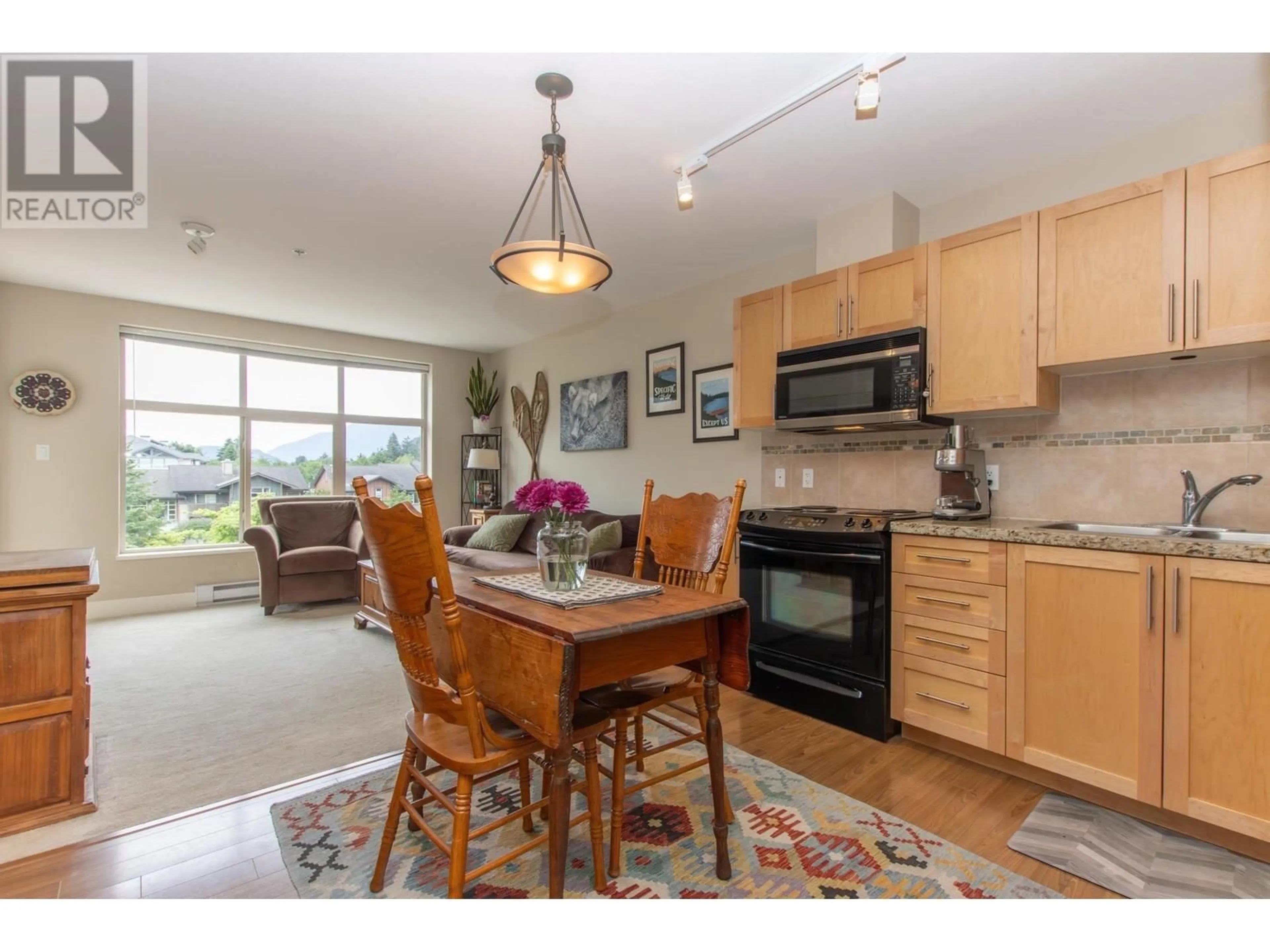 Open concept kitchen, unknown for 320 - 1211 VILLAGE GREEN WAY, Squamish British Columbia V8B0R7