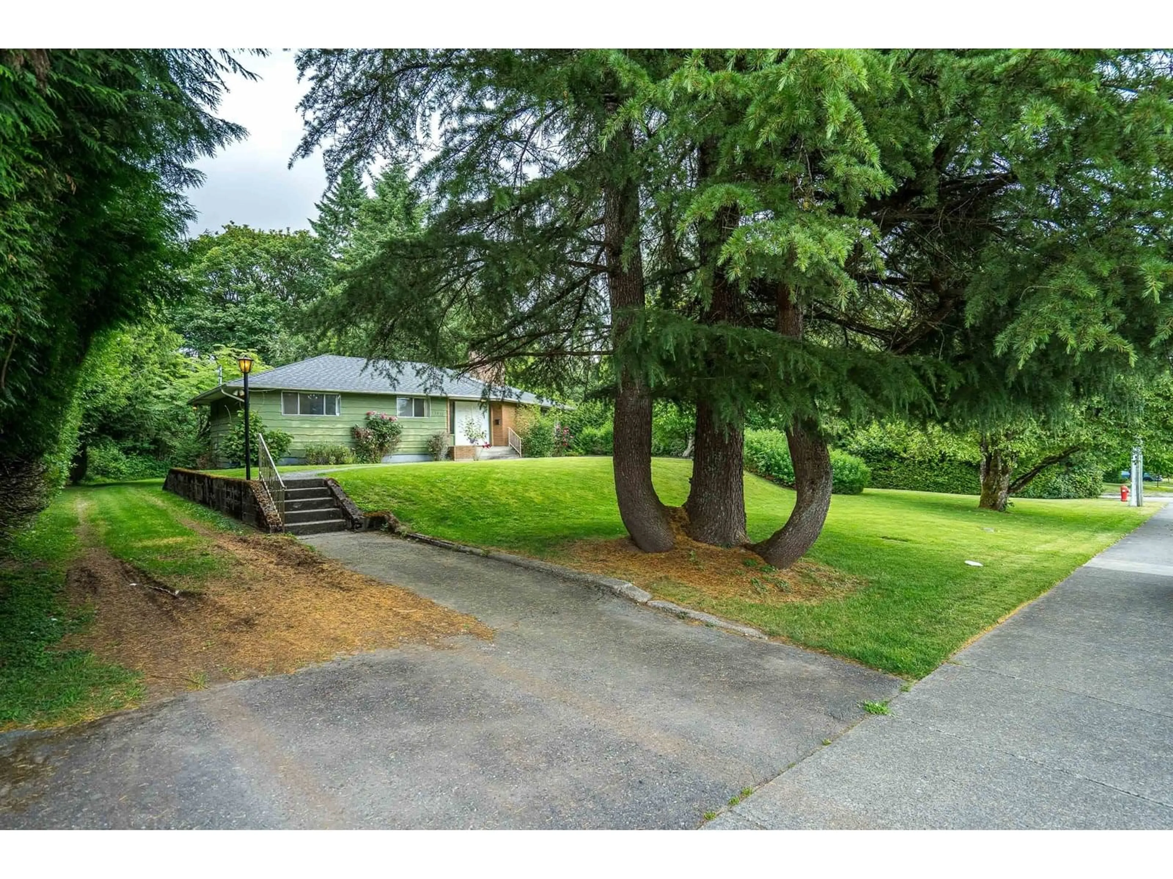 A pic from outside/outdoor area/front of a property/back of a property/a pic from drone, street for 15875 101A, Surrey British Columbia V4N2N6