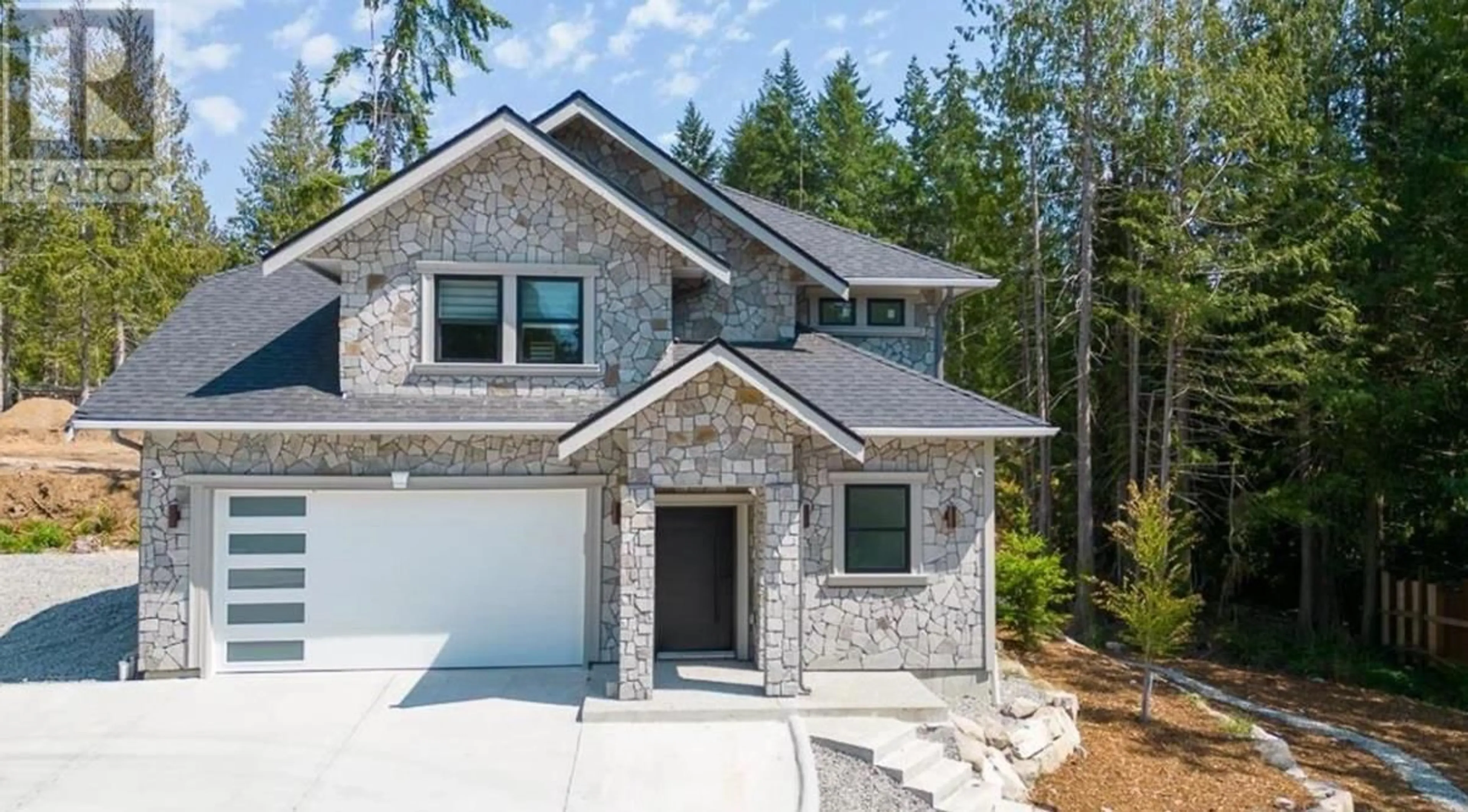 Home with brick exterior material, street for 1102 LARGO ROAD, Roberts Creek British Columbia V0N2W2