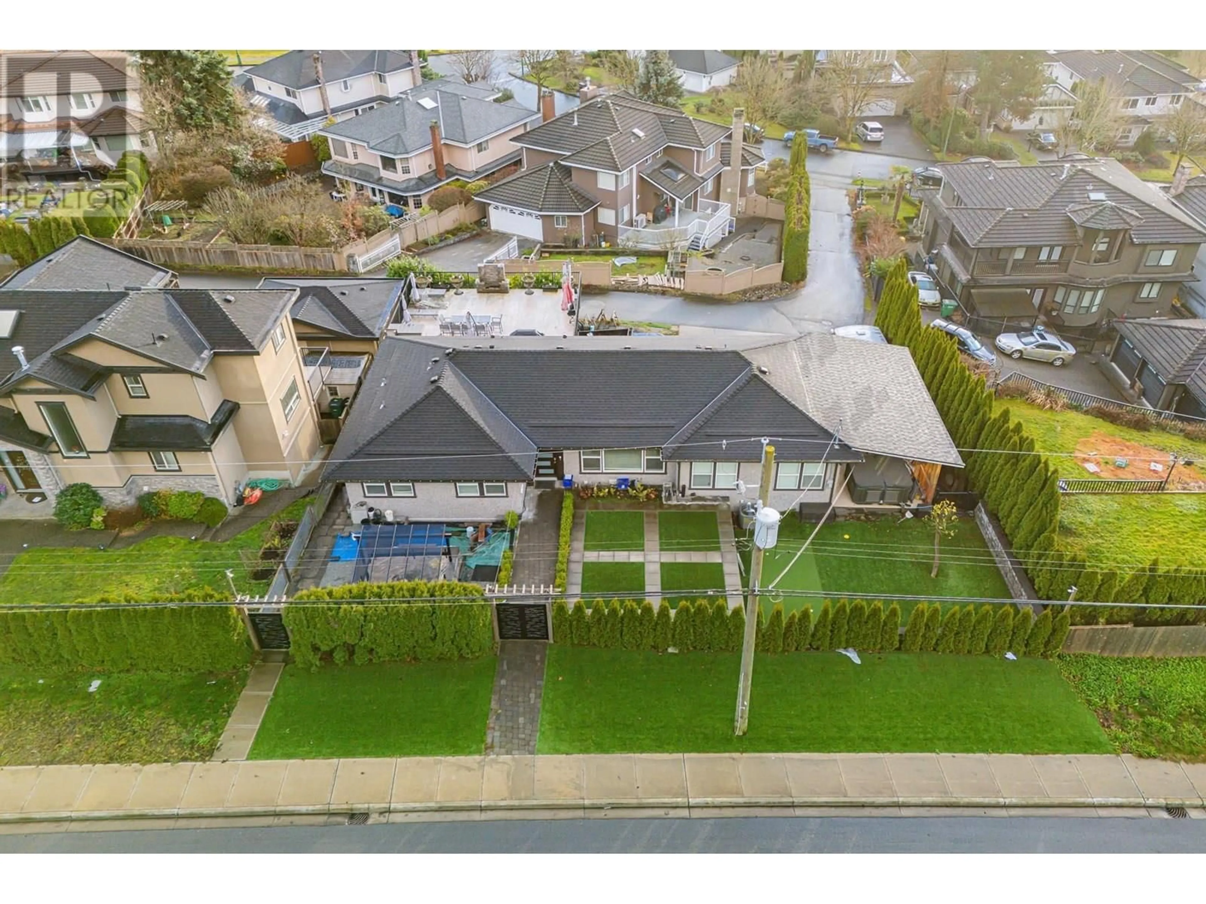 A pic from outside/outdoor area/front of a property/back of a property/a pic from drone, street for 7312 BROADWAY, Burnaby British Columbia V5A1S2