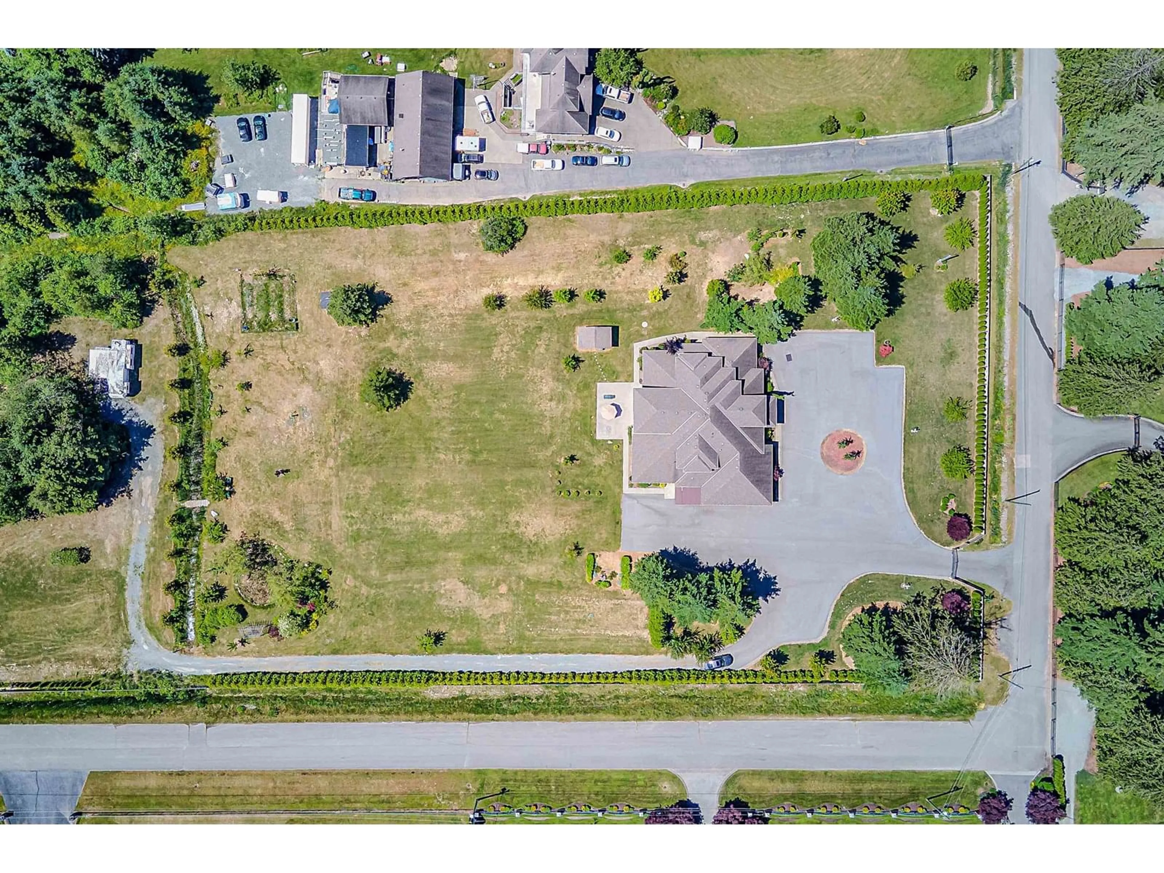 A pic from outside/outdoor area/front of a property/back of a property/a pic from drone, street for 26972 60, Langley British Columbia V4W1V6