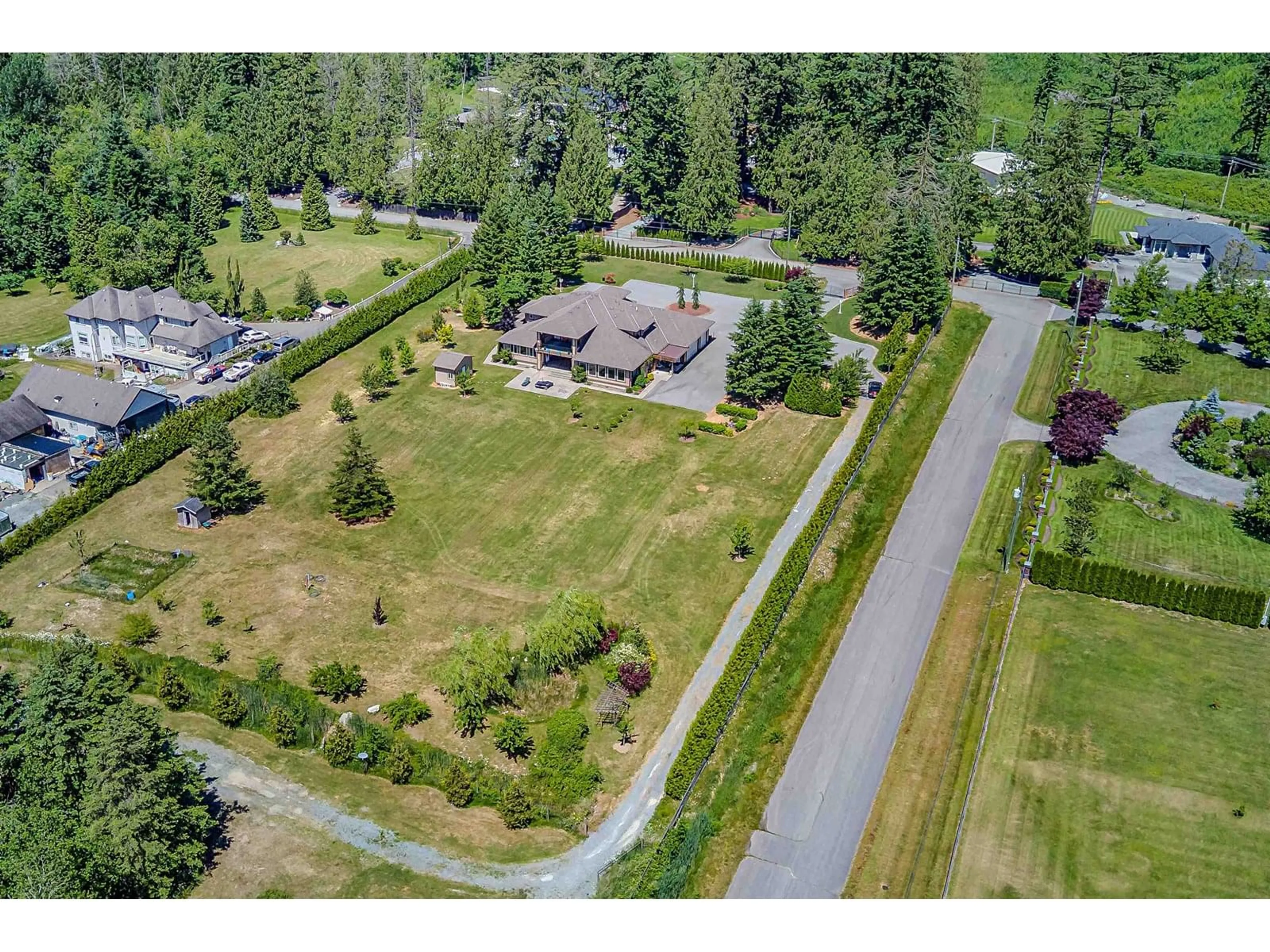 A pic from outside/outdoor area/front of a property/back of a property/a pic from drone, street for 26972 60, Langley British Columbia V4W1V6