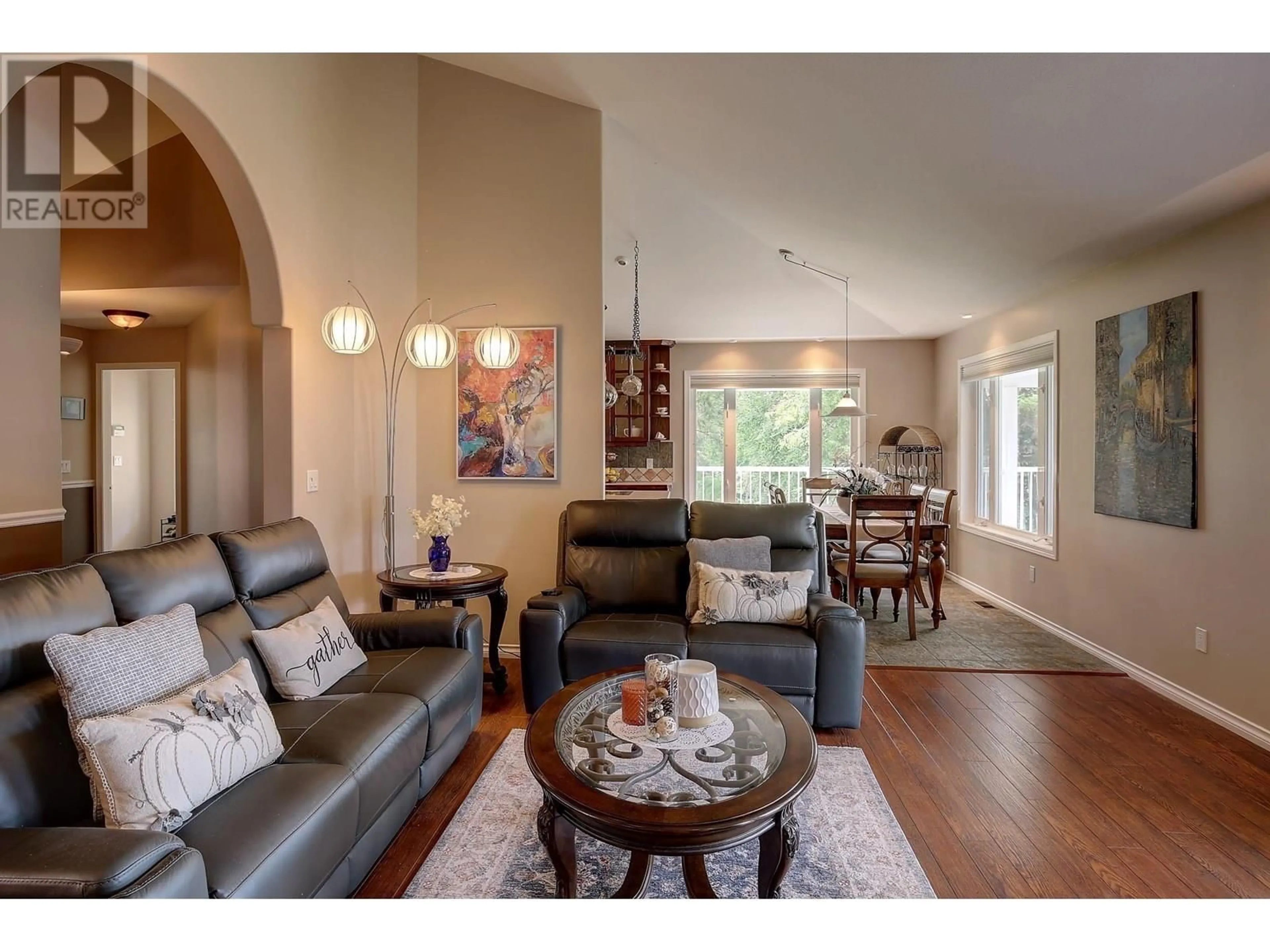 Living room with furniture, wood/laminate floor for 1802 SOUTH LAKESIDE DRIVE, Williams Lake British Columbia V2G5G1