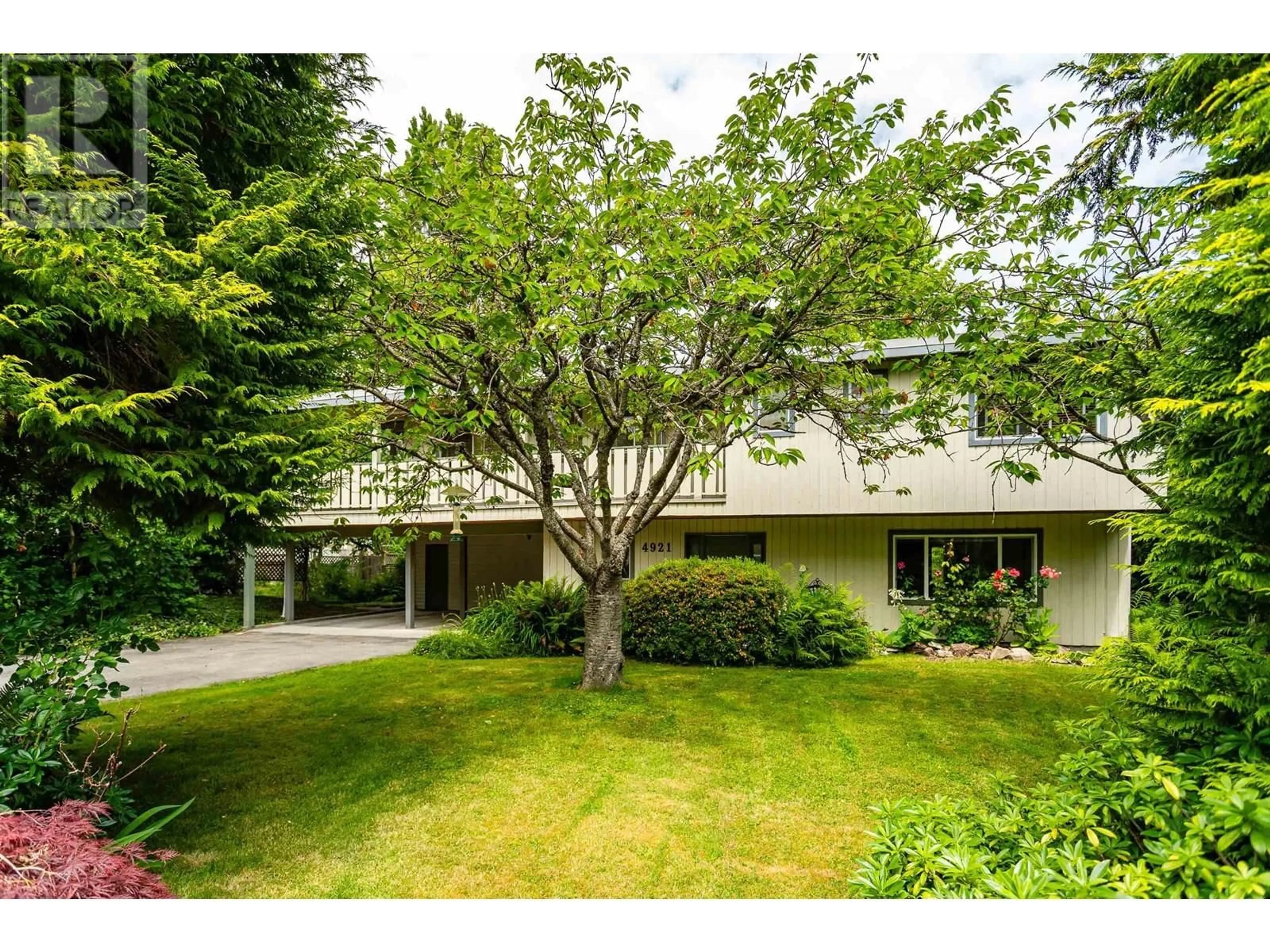 A pic from outside/outdoor area/front of a property/back of a property/a pic from drone, forest/trees view for 4921 11A AVENUE, Delta British Columbia V4M1Z5