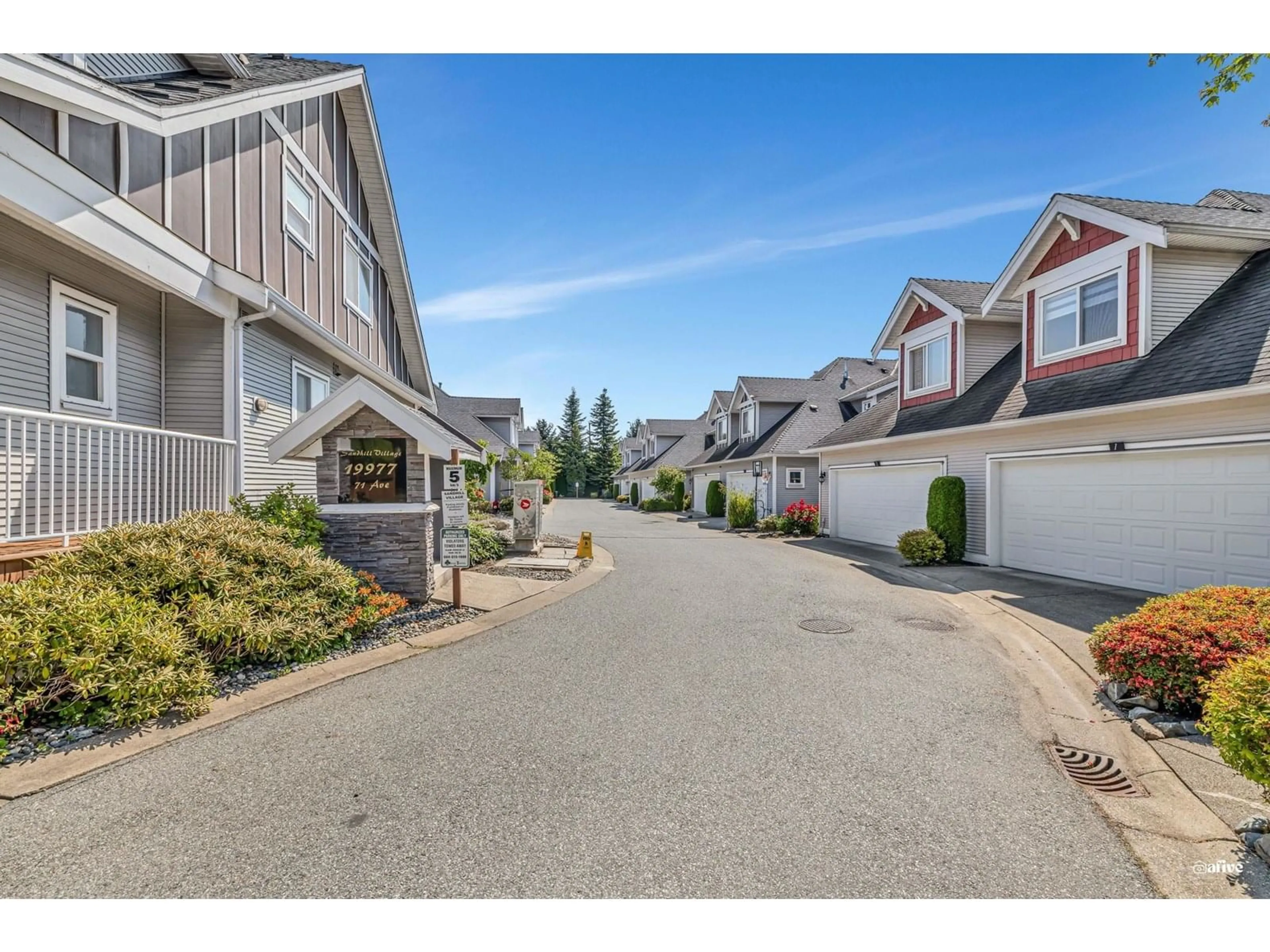 A pic from outside/outdoor area/front of a property/back of a property/a pic from drone, street for 9 - 19977 71, Langley British Columbia V2Y2Z4