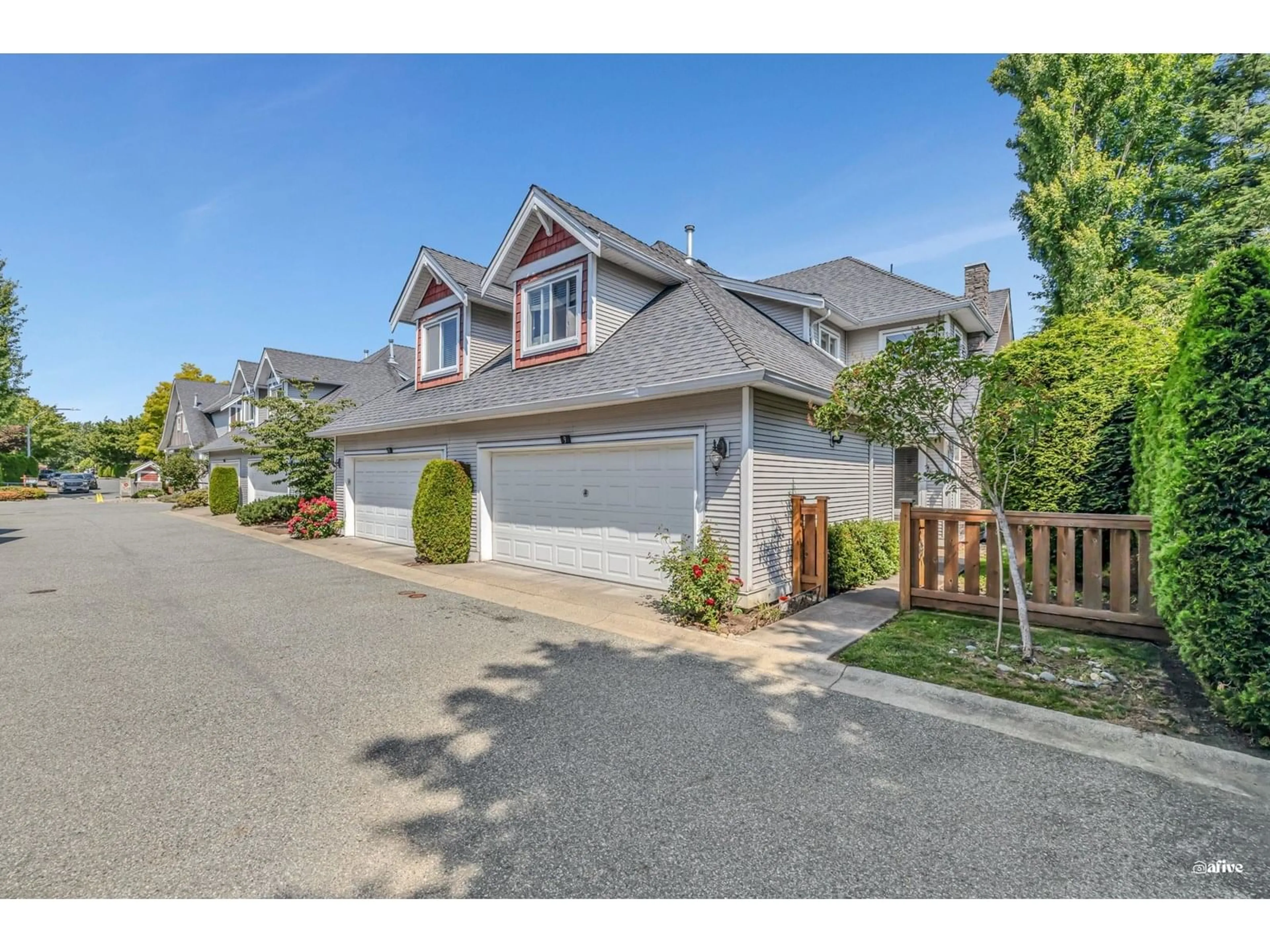 A pic from outside/outdoor area/front of a property/back of a property/a pic from drone, street for 9 - 19977 71, Langley British Columbia V2Y2Z4