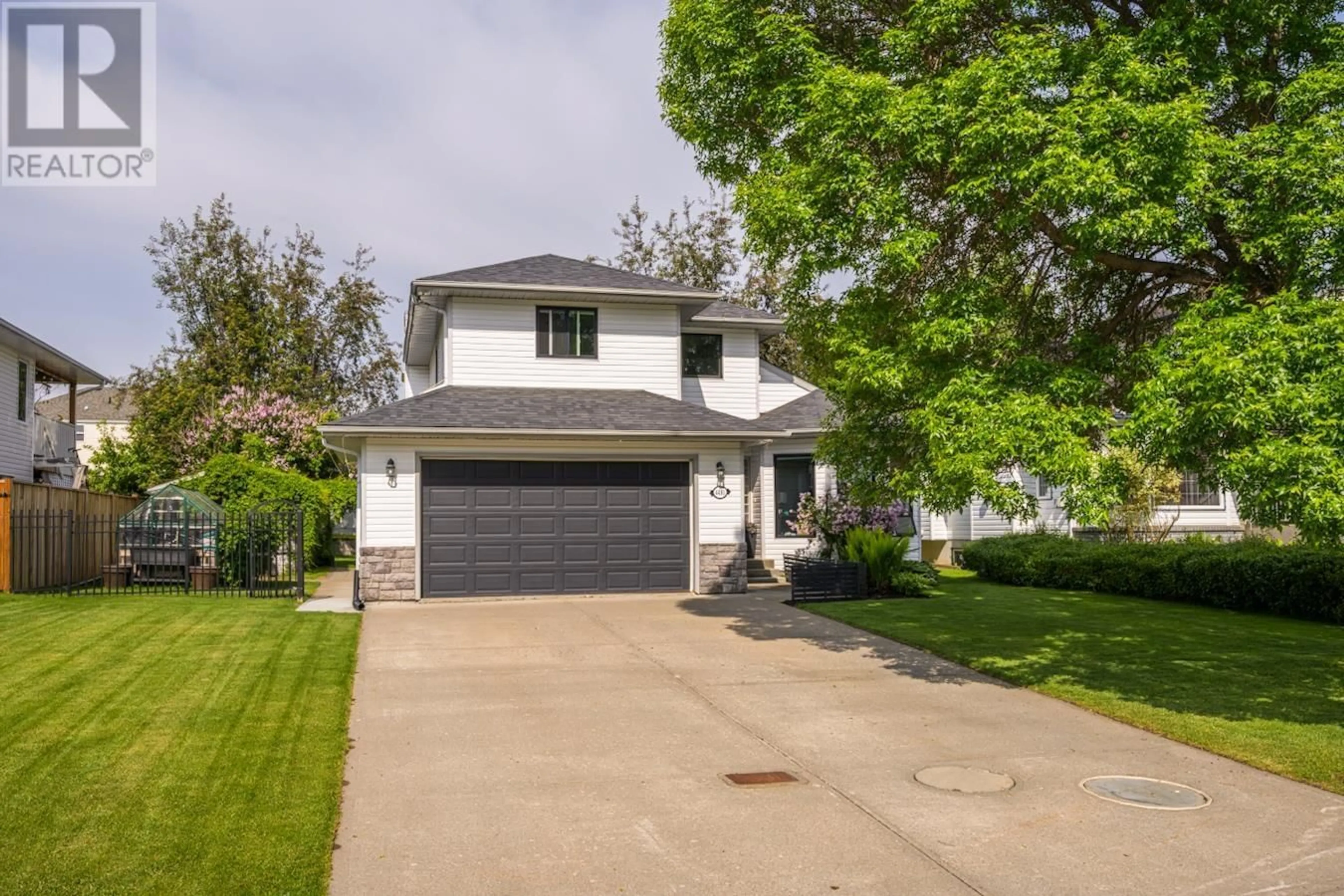Home with vinyl exterior material, street for 4491 RAINER CRESCENT, Prince George British Columbia V2K4X2