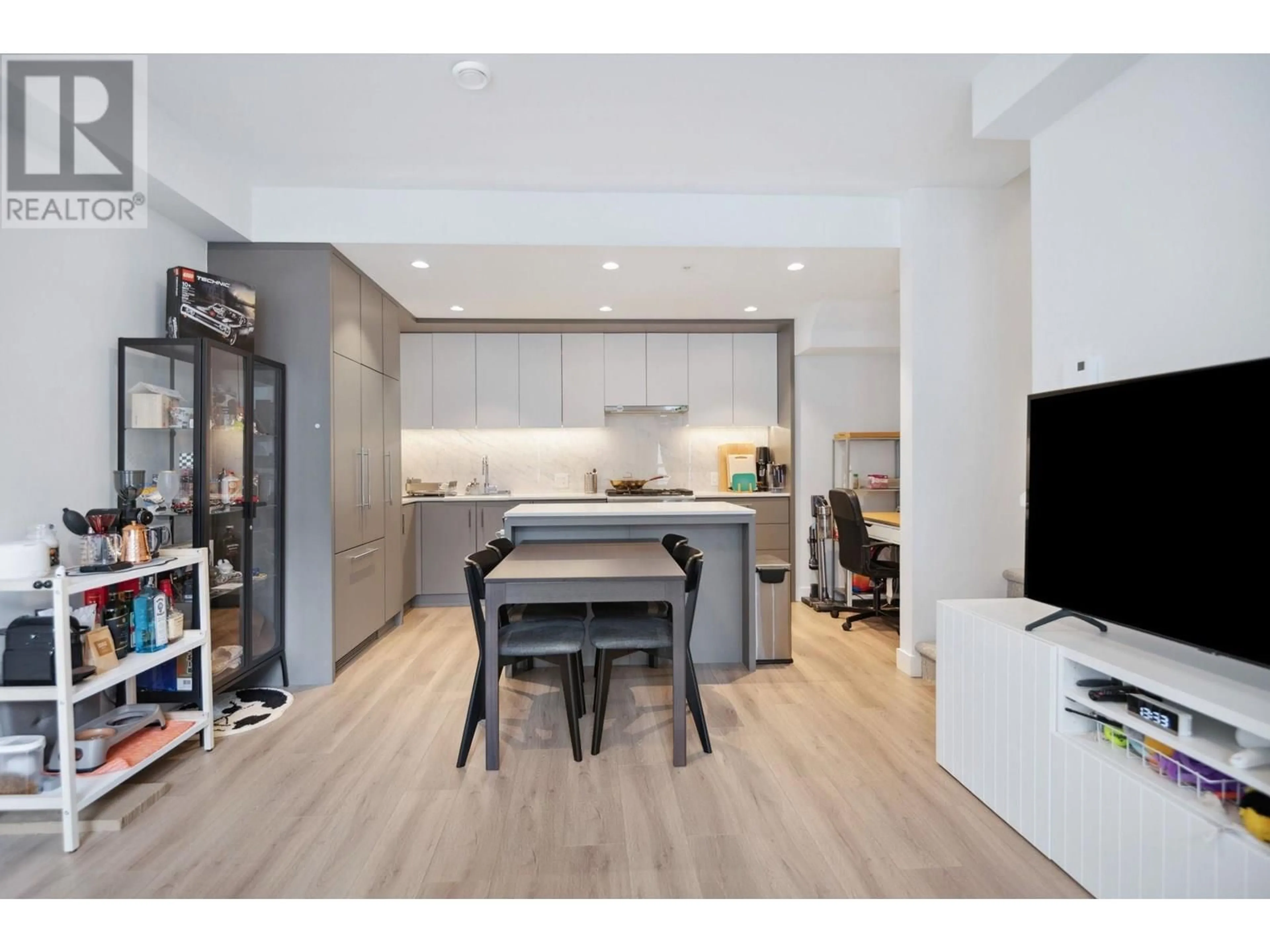 Open concept kitchen, wood/laminate floor for 206 - 6085 IRMIN STREET, Burnaby British Columbia V5J5C5