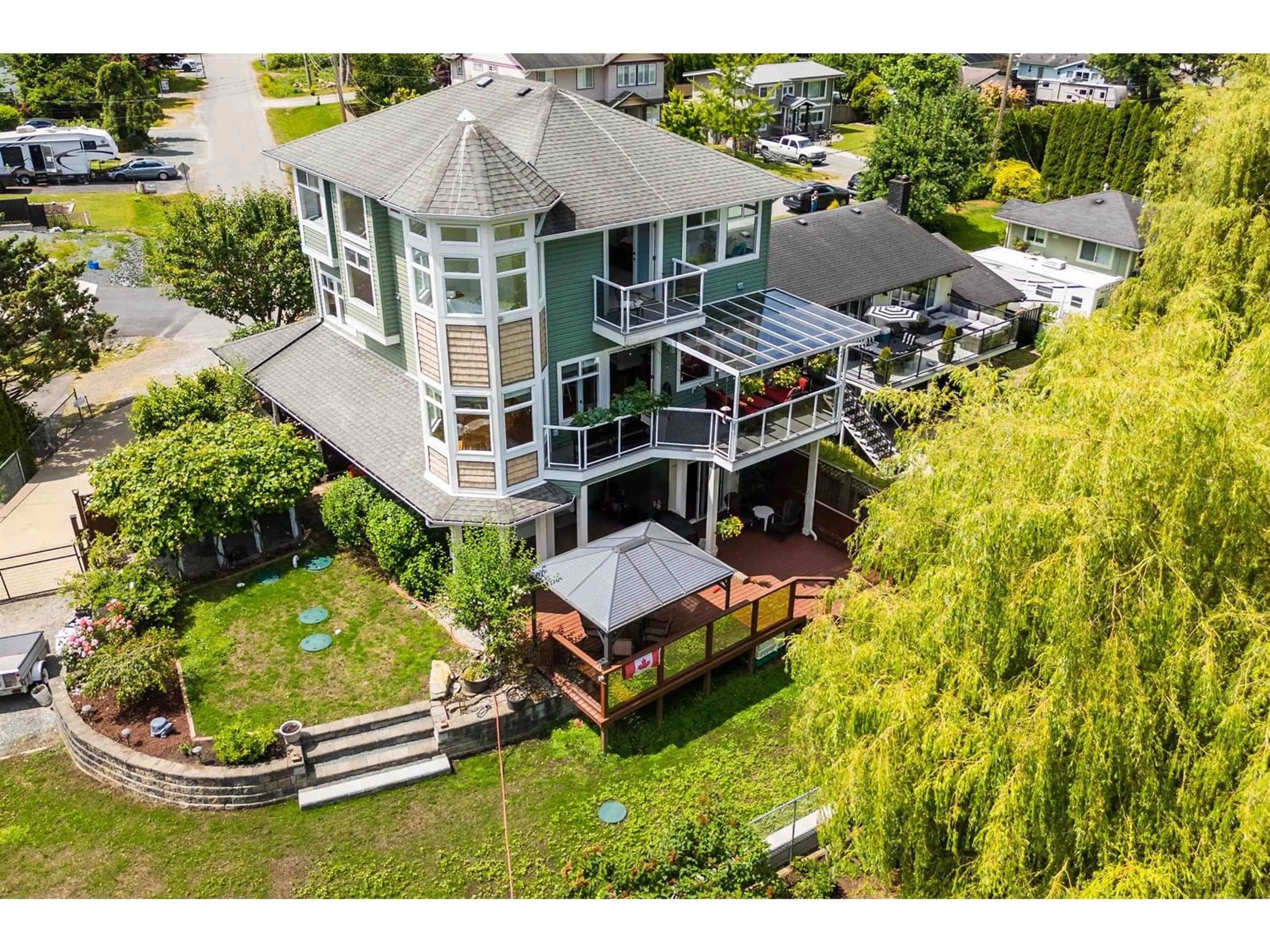 A pic from outside/outdoor area/front of a property/back of a property/a pic from drone, water/lake/river/ocean view for 8408 BENBOW, Mission British Columbia V2V7L6