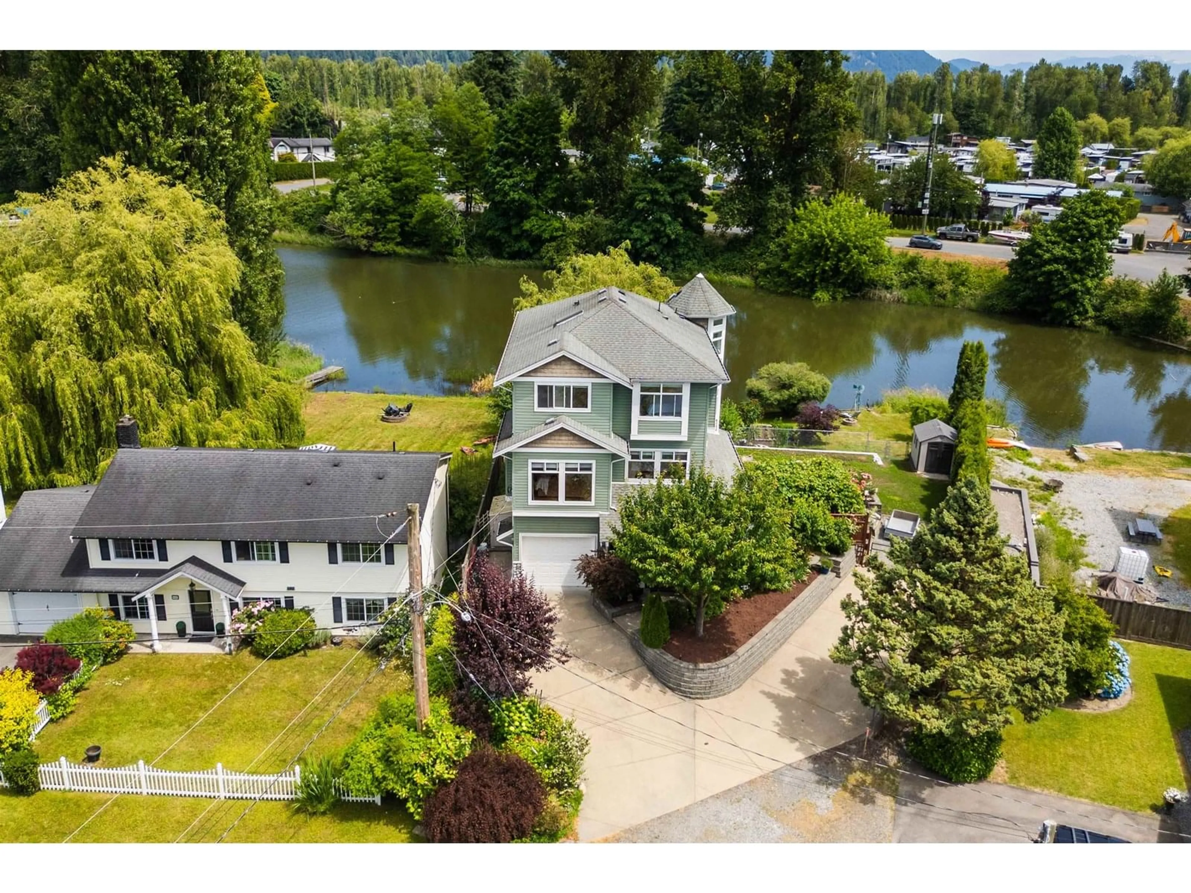 A pic from outside/outdoor area/front of a property/back of a property/a pic from drone, water/lake/river/ocean view for 8408 BENBOW, Mission British Columbia V2V7L6