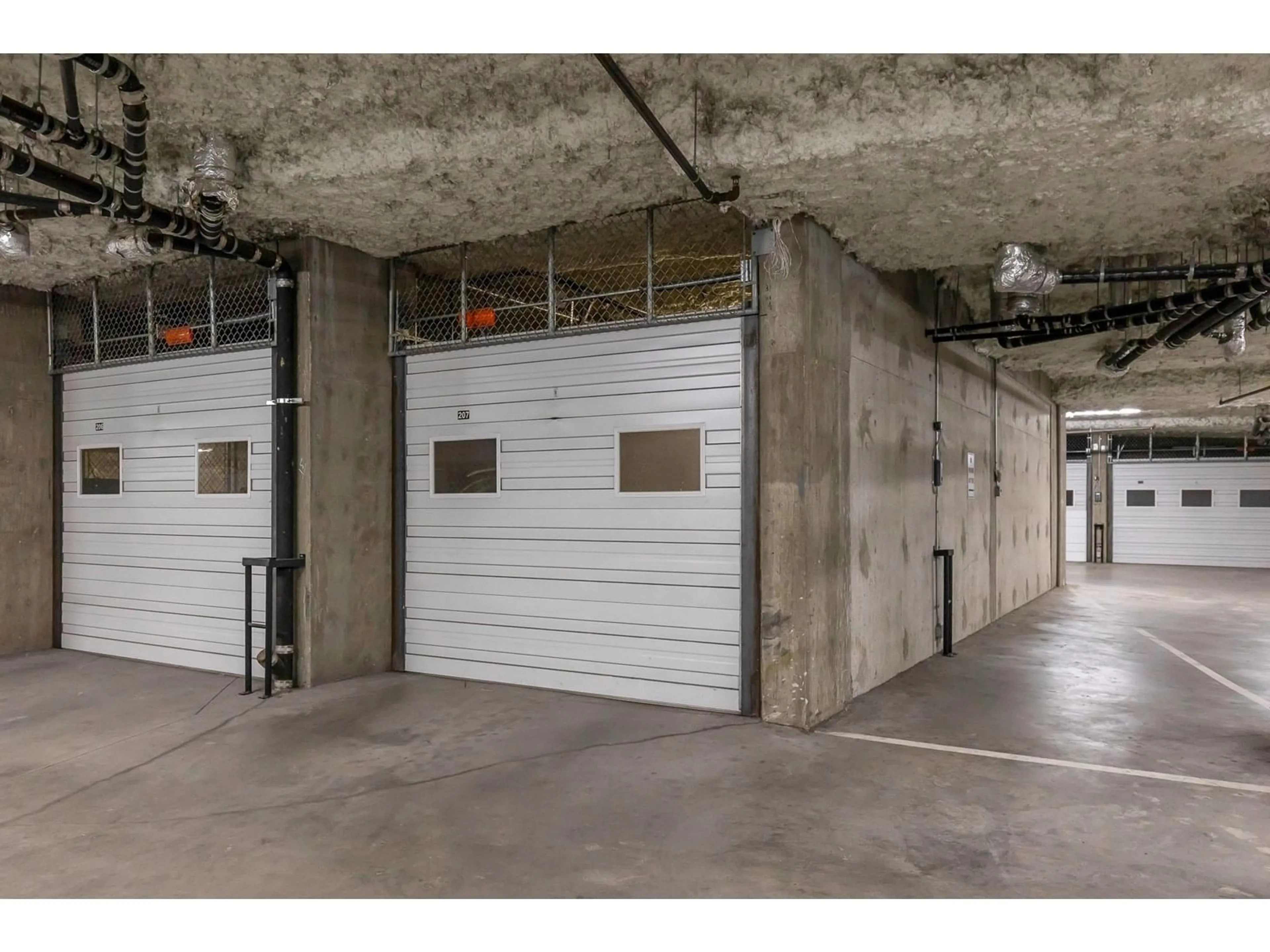 Indoor garage for 207 - 33485 SOUTH FRASER, Abbotsford British Columbia V2S8P9