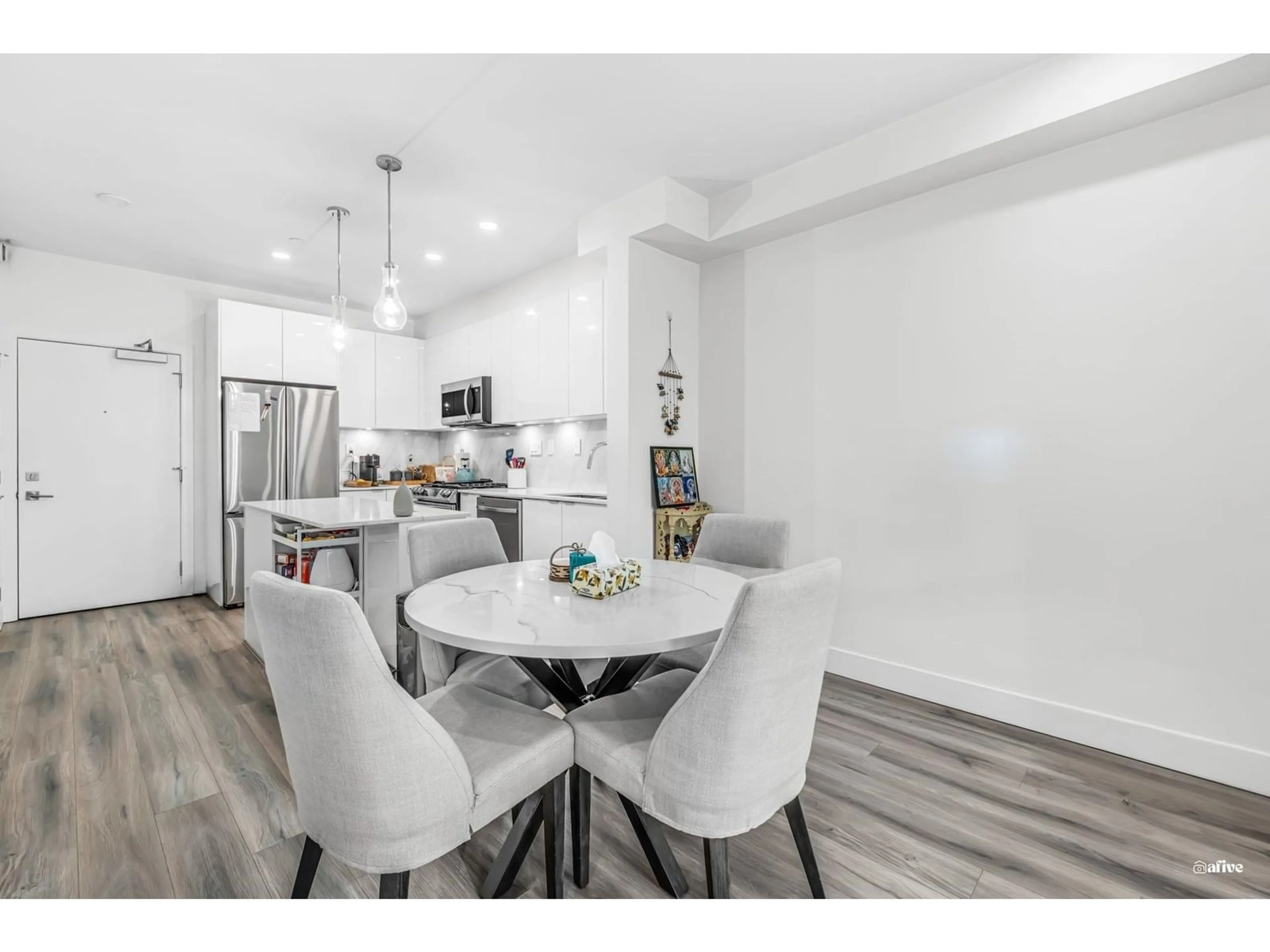 Open concept kitchen, unknown for A306 - 8447 202, Langley British Columbia V2Y2B7