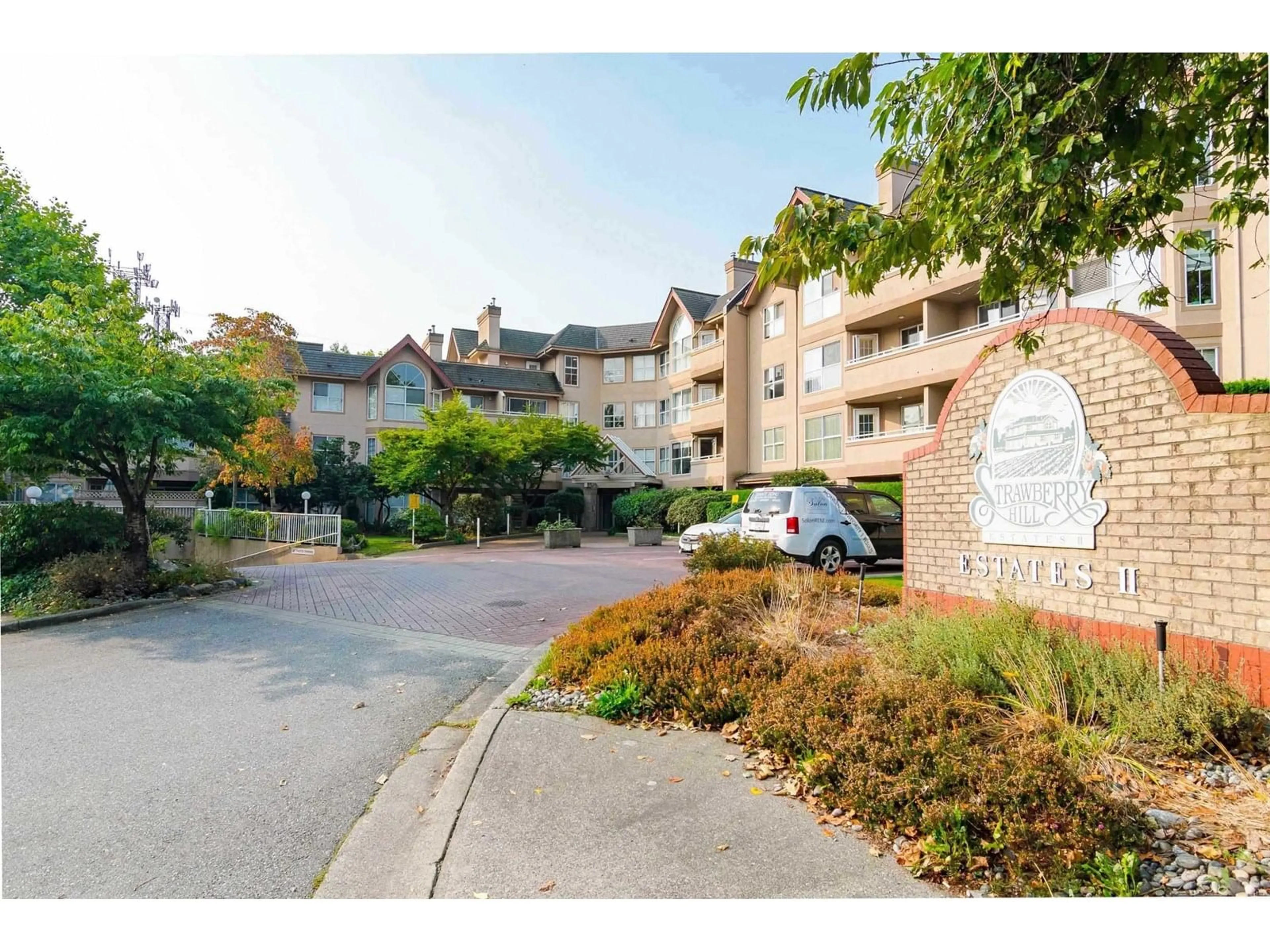 A pic from outside/outdoor area/front of a property/back of a property/a pic from drone, mountain view for 102 - 7435 121A, Surrey British Columbia V3W0W8