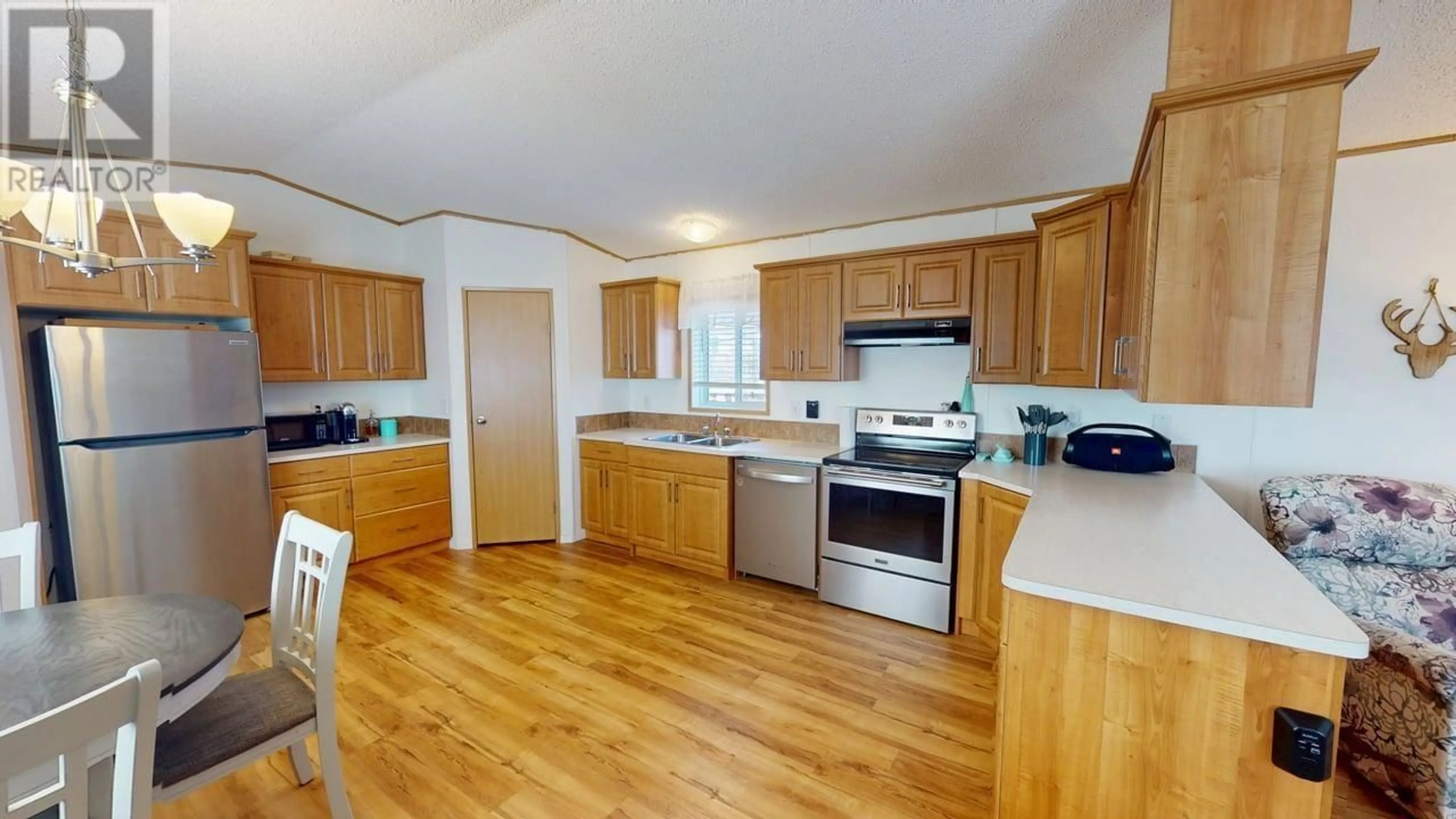 Standard kitchen, wood/laminate floor for 8612 79A STREET, Fort St. John British Columbia V1J0H7