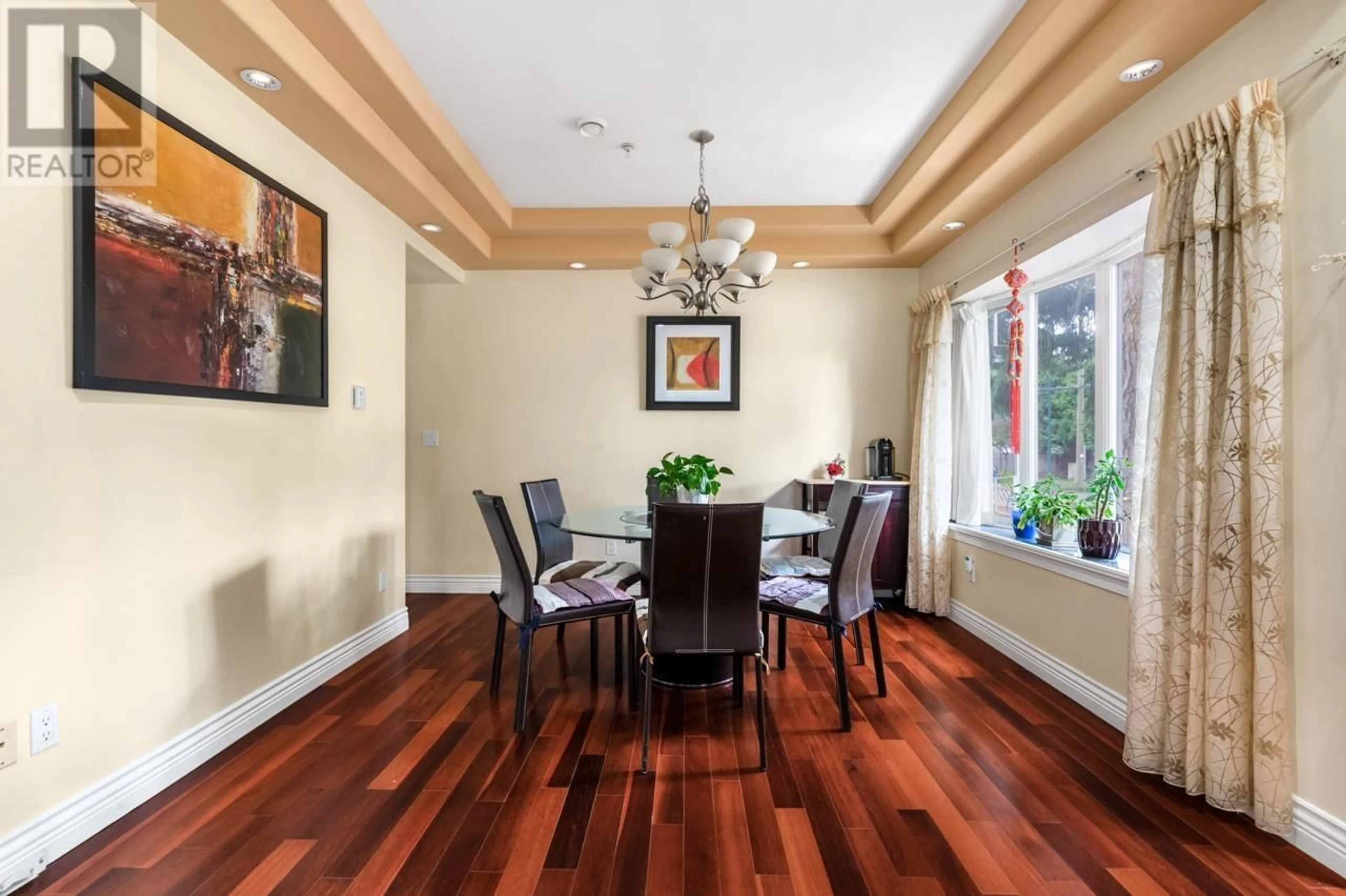 Dining room, wood/laminate floor for 5396 RHODES STREET, Vancouver British Columbia V5R3N8