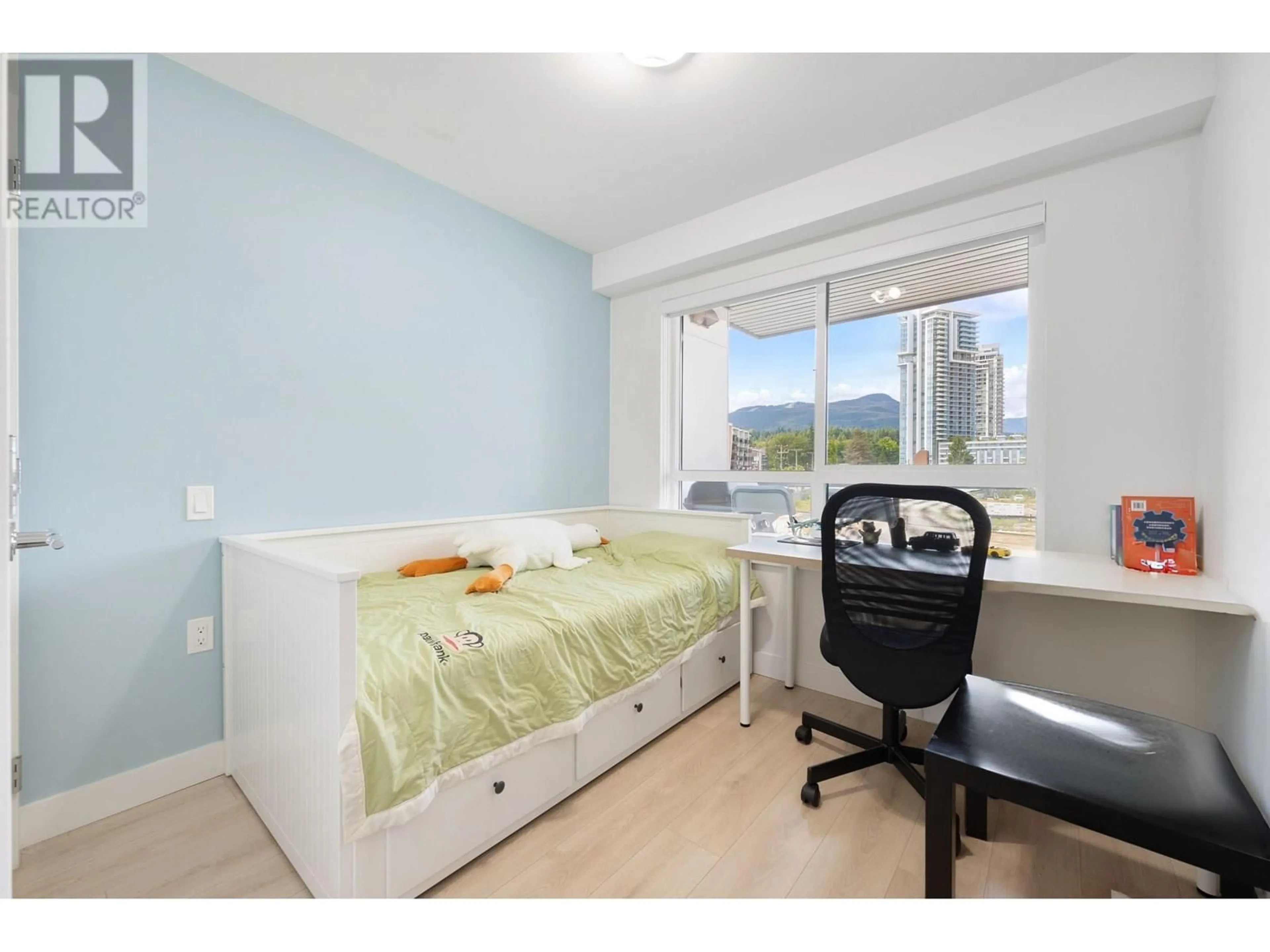 Bedroom with bed, wood/laminate floor for 309 - 1519 CROWN STREET, North Vancouver British Columbia V7J1G6