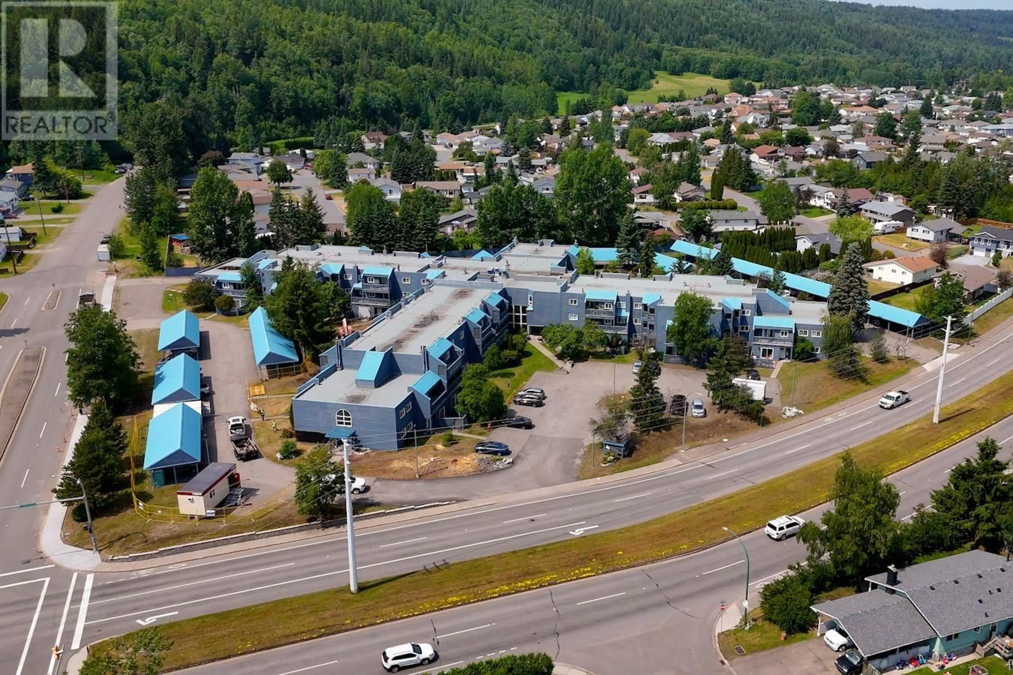 A pic from outside/outdoor area/front of a property/back of a property/a pic from drone, mountain view for 211 - 3033 OSPIKA BOULEVARD, Prince George British Columbia V2N4L5