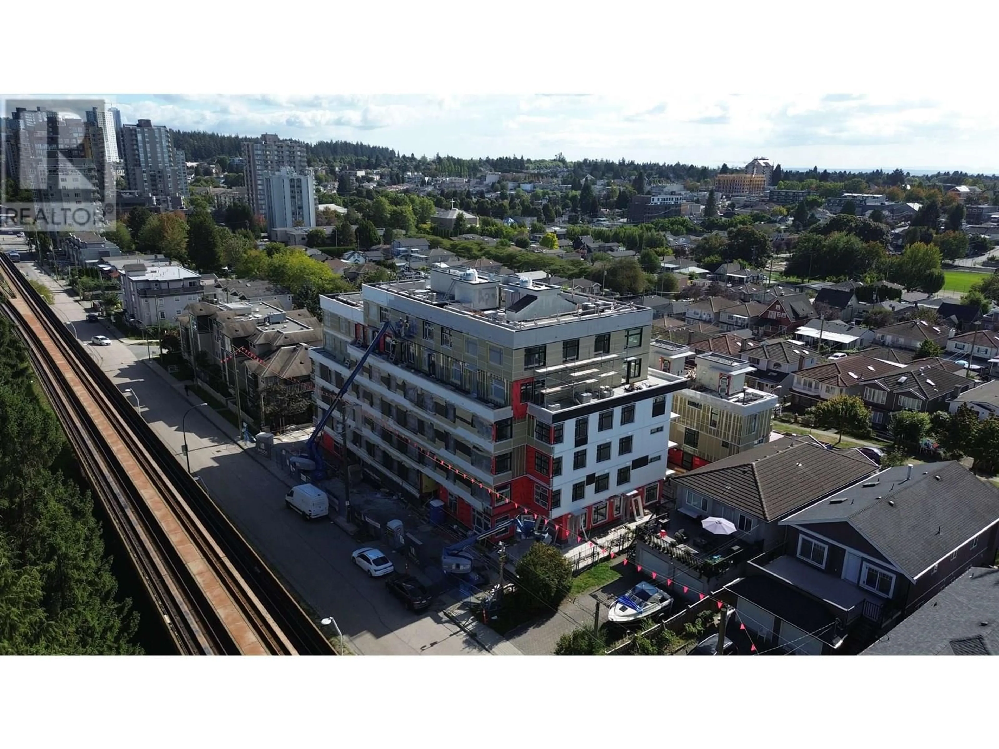 A pic from outside/outdoor area/front of a property/back of a property/a pic from drone, city buildings view from balcony for 405 - 3264 VANNESS AVENUE, Vancouver British Columbia V5R4V3