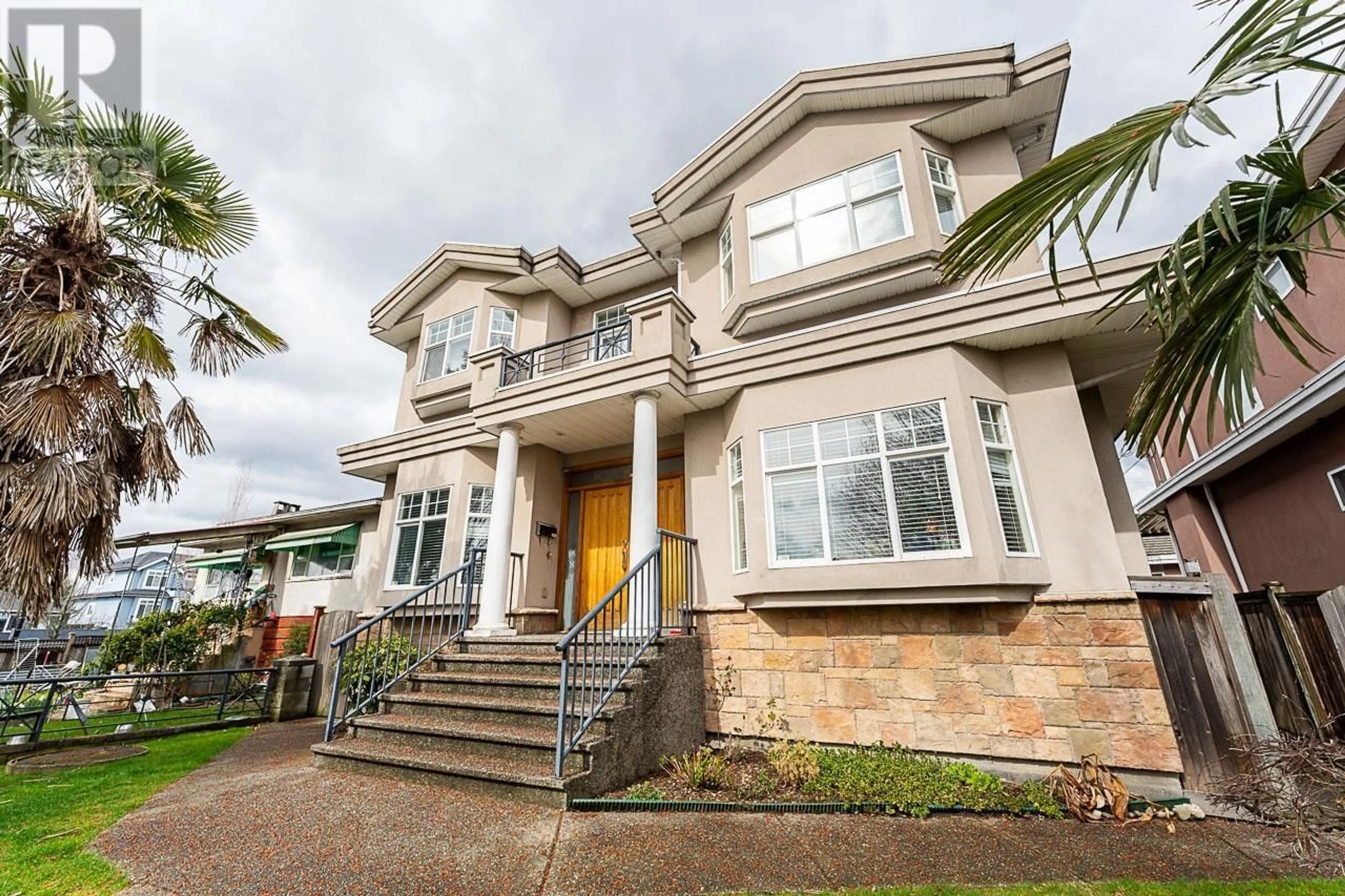 Home with vinyl exterior material, street for 1437 58TH AVENUE, Vancouver British Columbia V5P2B9