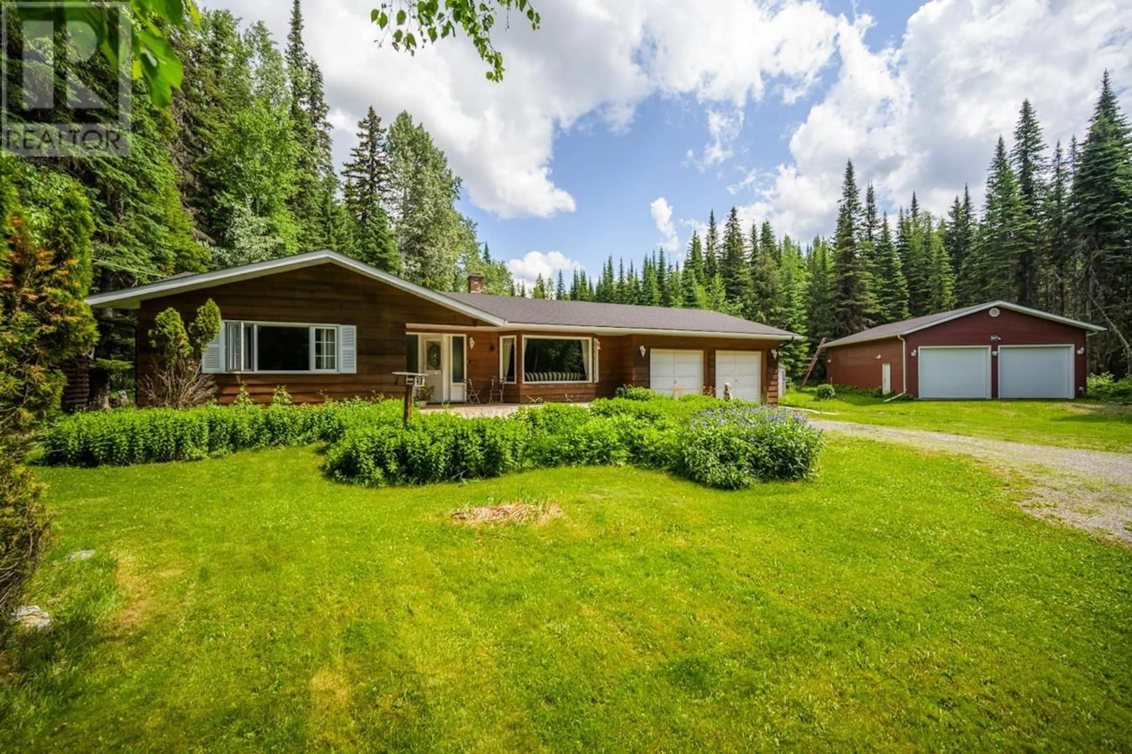 A pic from outside/outdoor area/front of a property/back of a property/a pic from drone, unknown for 10340 HUCKLEBERRY ROAD, Prince George British Columbia V2K5J1