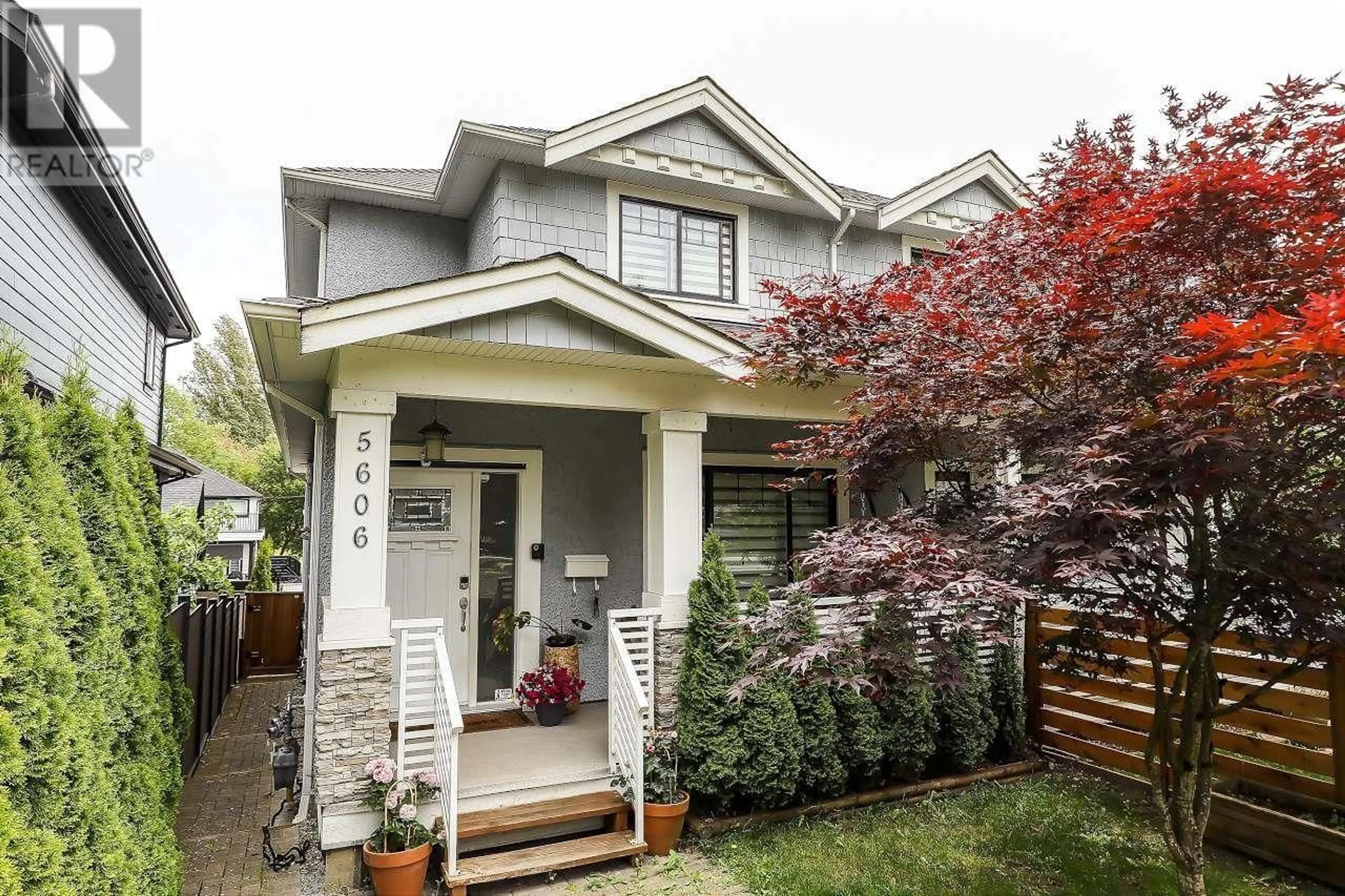 Home with vinyl exterior material, street for 5606 RHODES STREET, Vancouver British Columbia V5R3N9