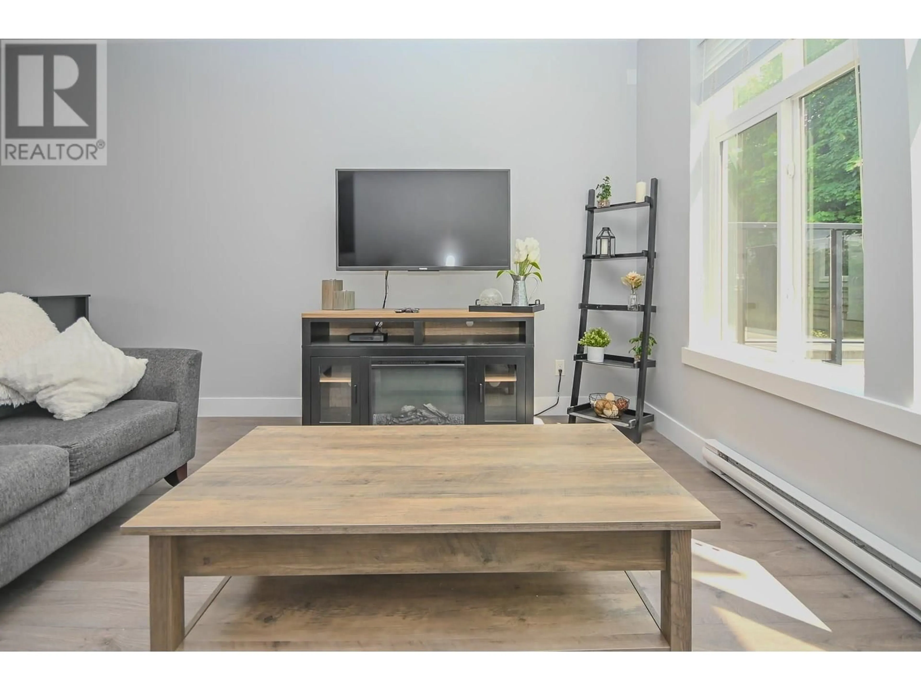 Living room with furniture, wood/laminate floor for 51 - 24108 104 AVENUE AVENUE, Maple Ridge British Columbia V2W1J2