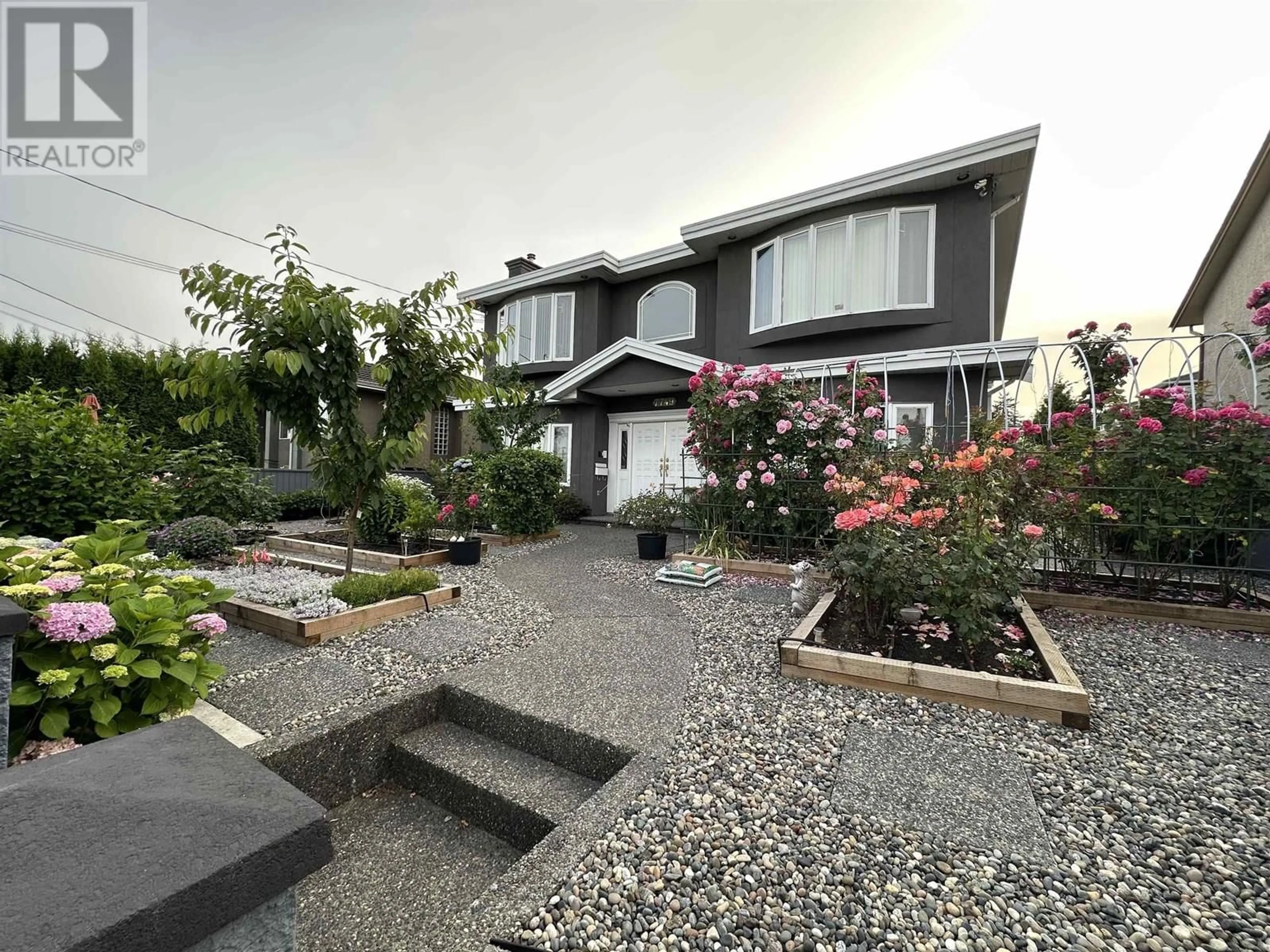 A pic from outside/outdoor area/front of a property/back of a property/a pic from drone, street for 7749 GILLEY AVENUE, Burnaby British Columbia V5J4Y1