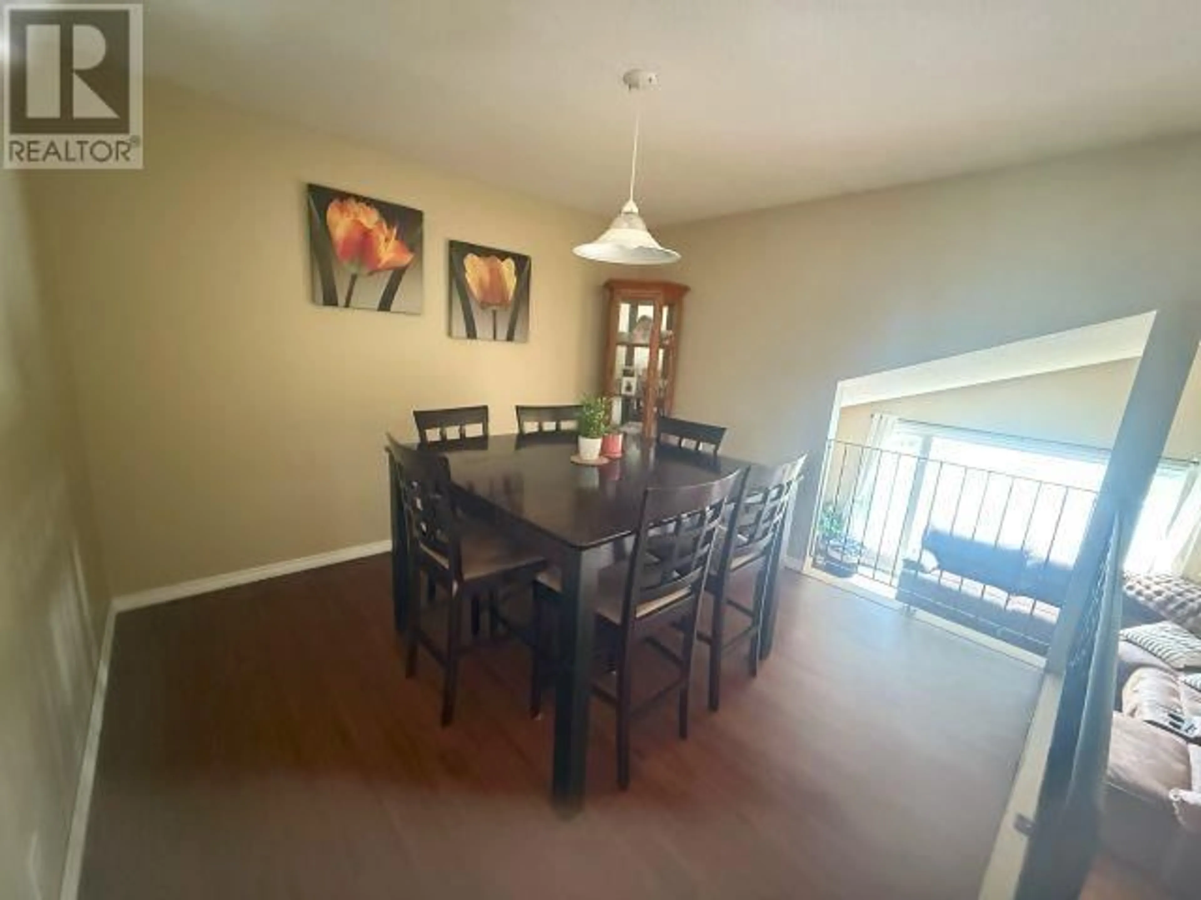 Dining room, wood/laminate floor for 8248 ST LAWRENCE AVENUE, Prince George British Columbia V2N4K8